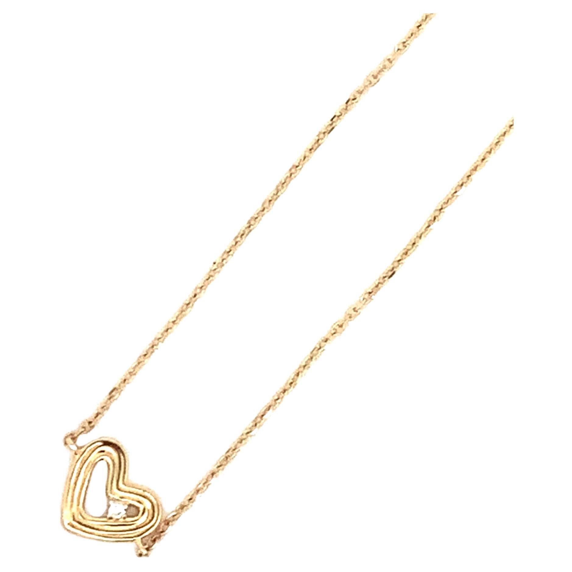 Adina Reyter One of a Kind Groovy Heart Bracelet - Y14

14K yellow gold groovy heart bracelet with prong-set round diamond. 

Measurements: Heart measures 8 mm wide x 7 mm tall. Adjustable chain lengths 6