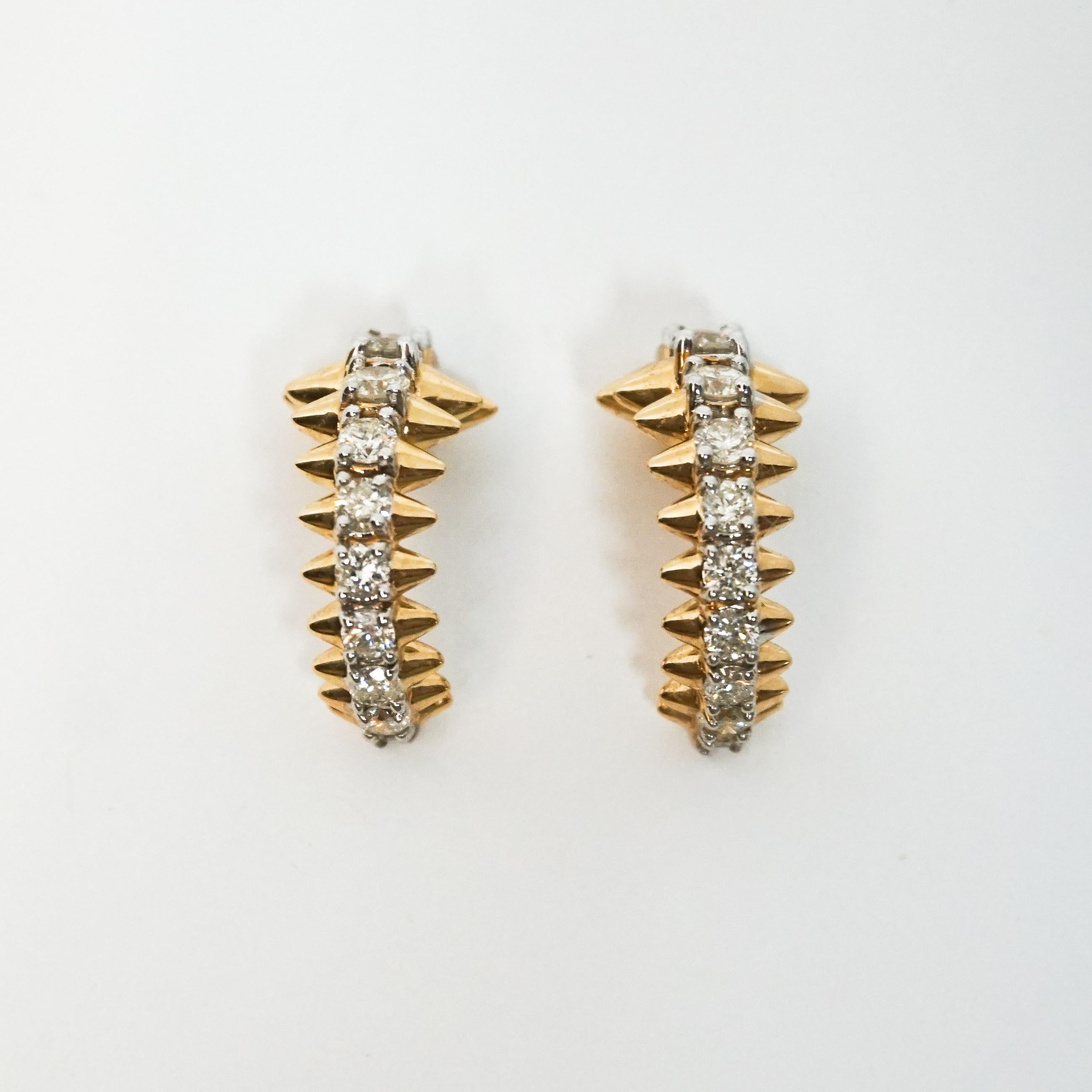 Adina Reyter One of a Kind Large Diamond Spike Dragon Hoops - Y14

Add an edgy flare to your ensemble with these One of a Kind Large Diamond Spike Dragon Hoops. 14k yellow gold huggie hoops with graduated spikes and prong set diamond rounds.

Total