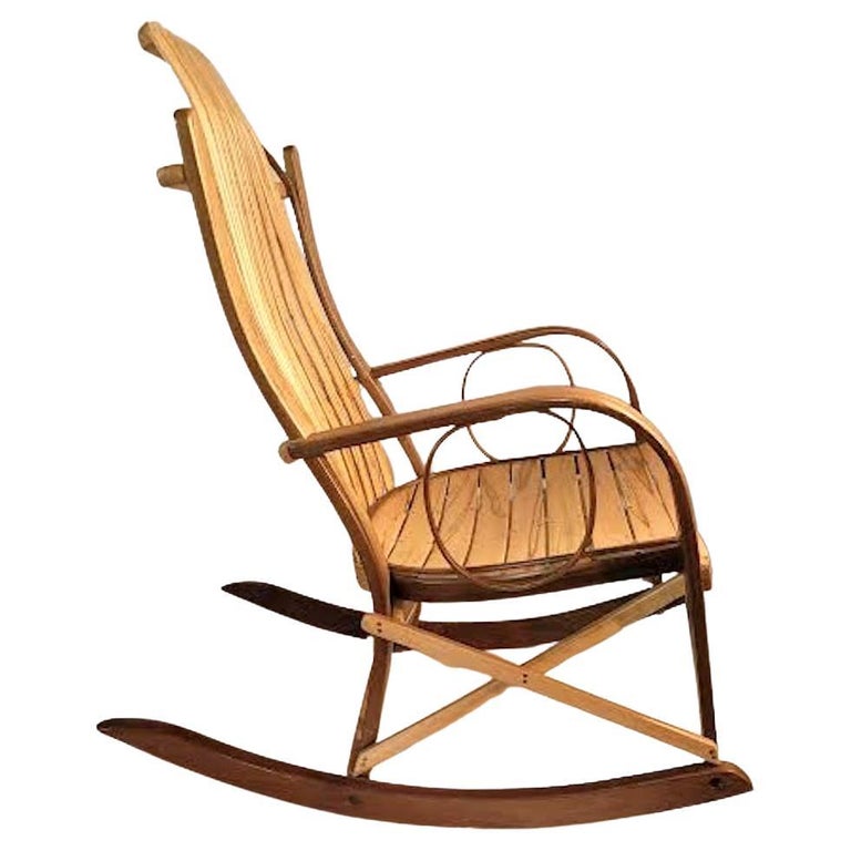  This is a new Adirondack  rocker In the style of Thomas Moser. It also is very similar to the new Amish bentwood rocking chair.This is one of the most comfortable rocking chair.