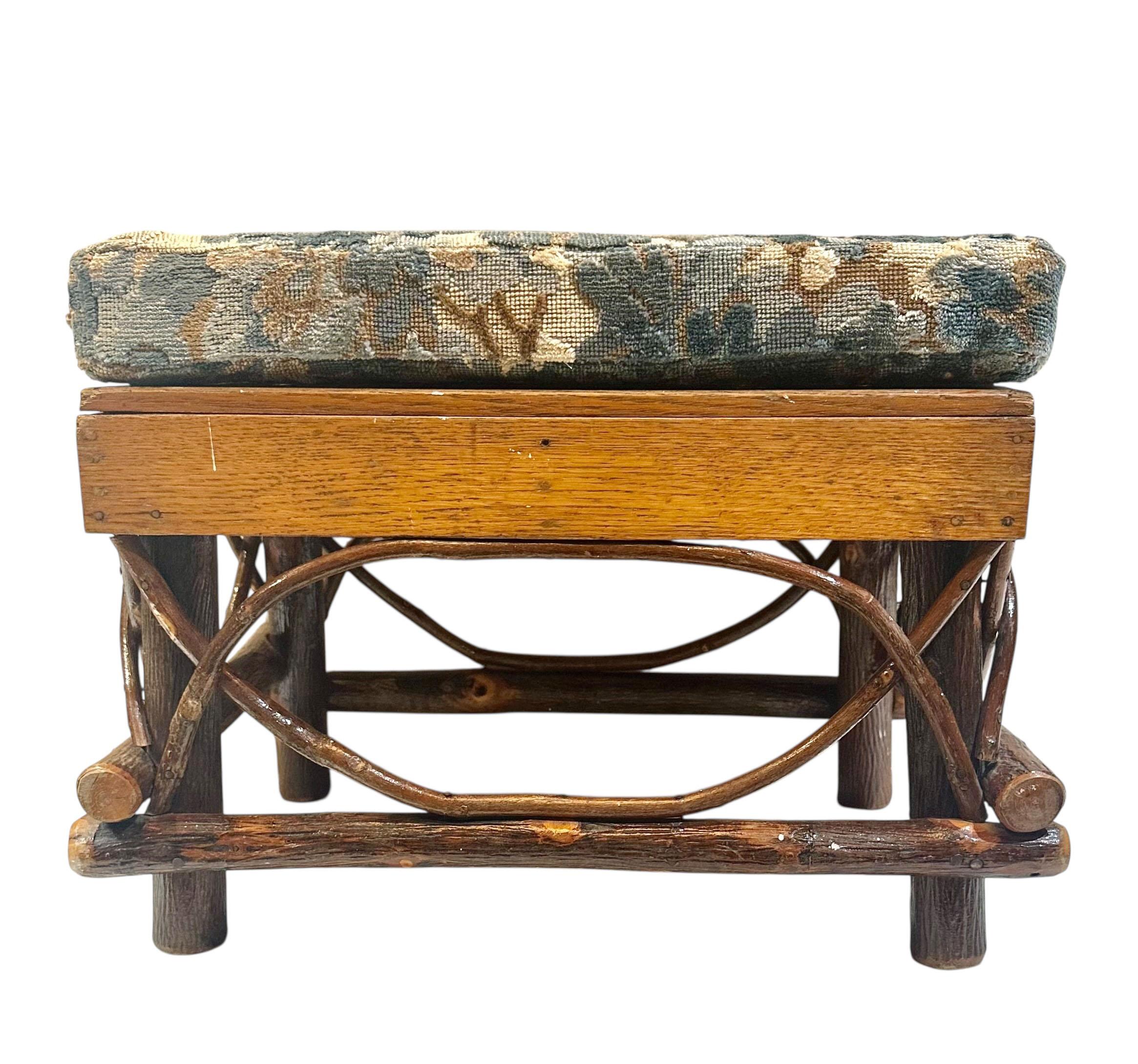 A charming and rustic 1940s Adirondack twig stool, featuring a vintage cut velvet cushion in rich tones and texture. The cushion is securely attached with snaps, making it both practical and stylish.

This piece embodies the natural elegance and