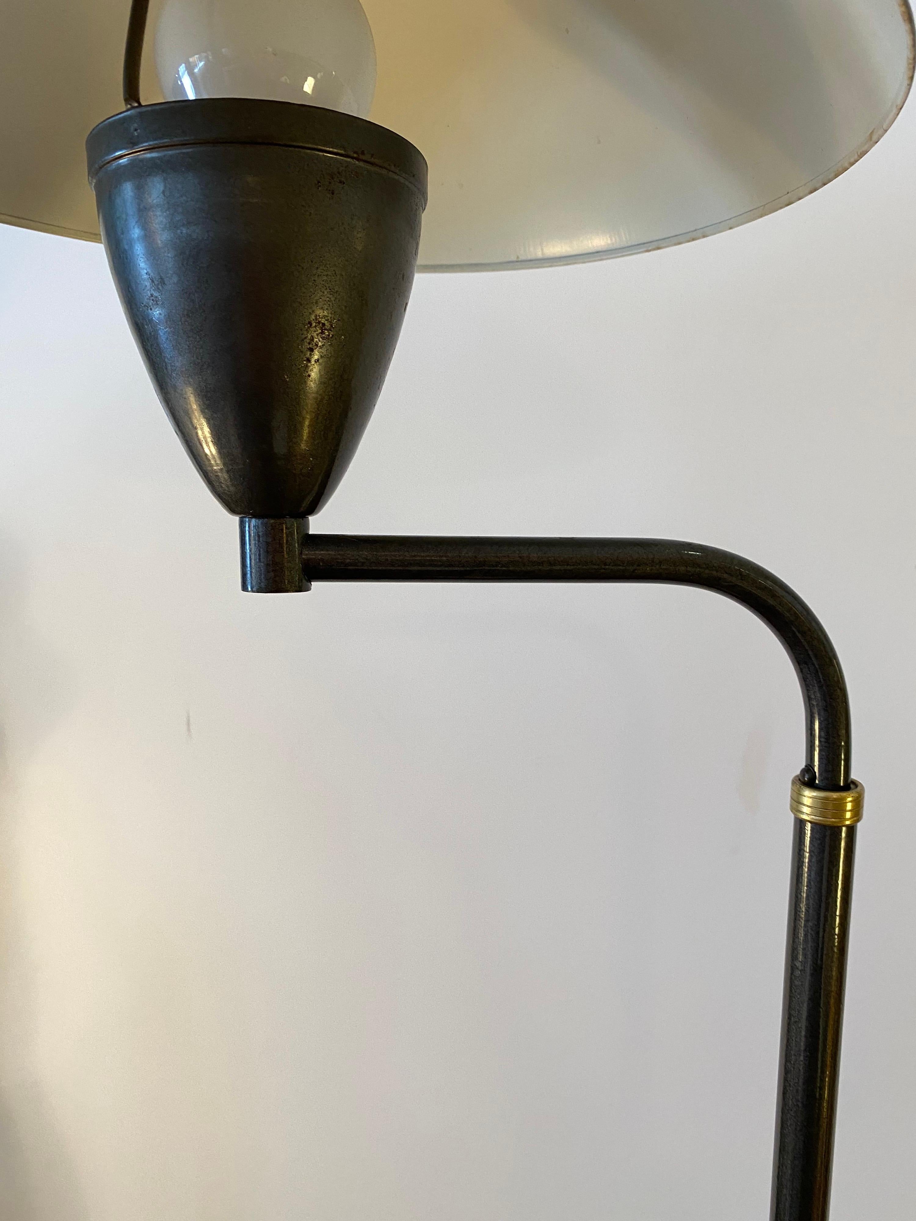 Adjustable floor lamp. Lamp adjusts from 41