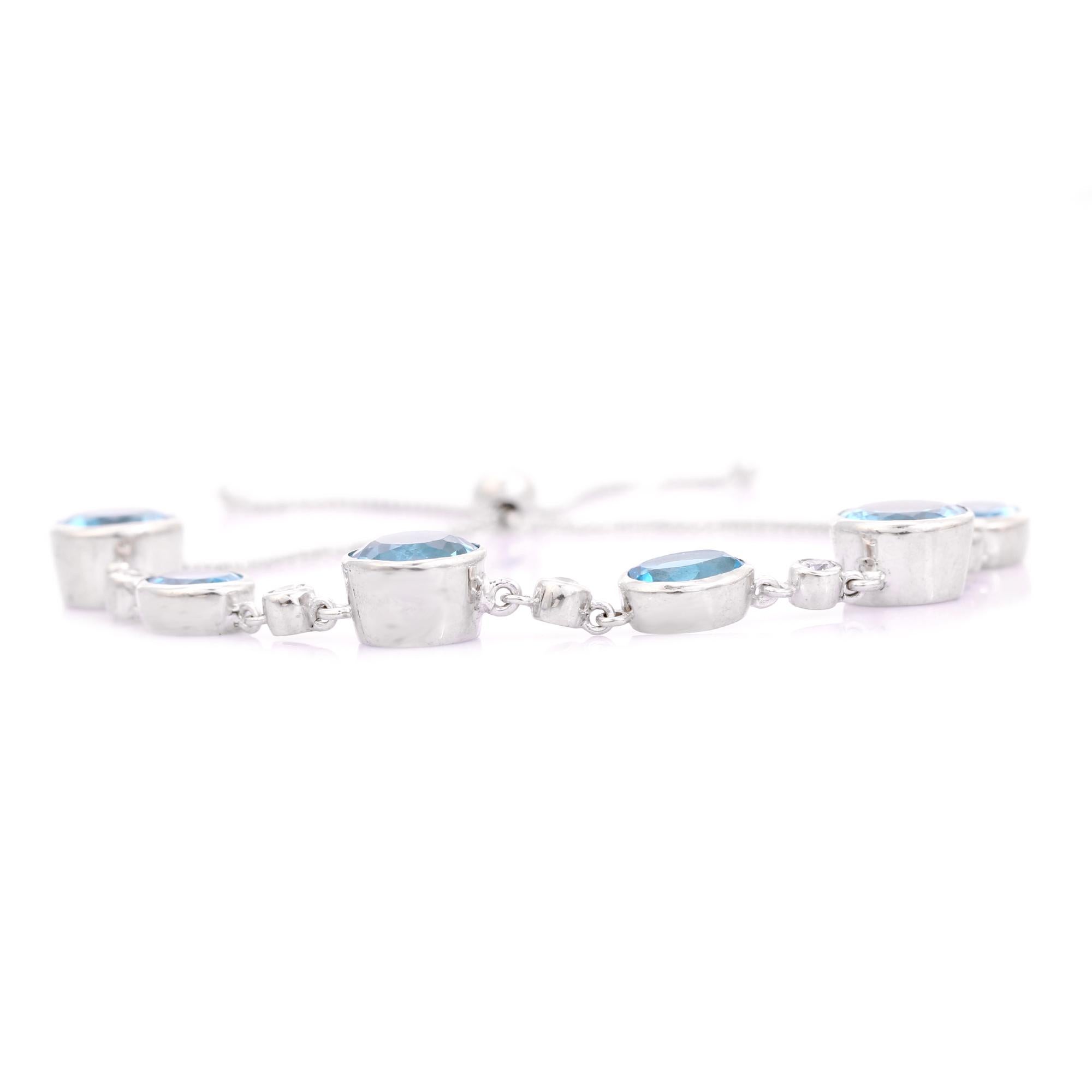Women's Adjustable 925 Silver Bolo Bracelet with Faceted Blue Topaz and White CZ Stones For Sale
