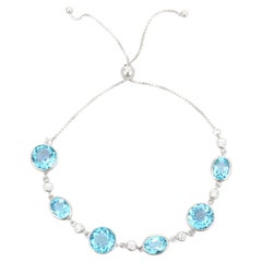 Adjustable 925 Silver Bolo Bracelet with Faceted Blue Topaz and White CZ Stones