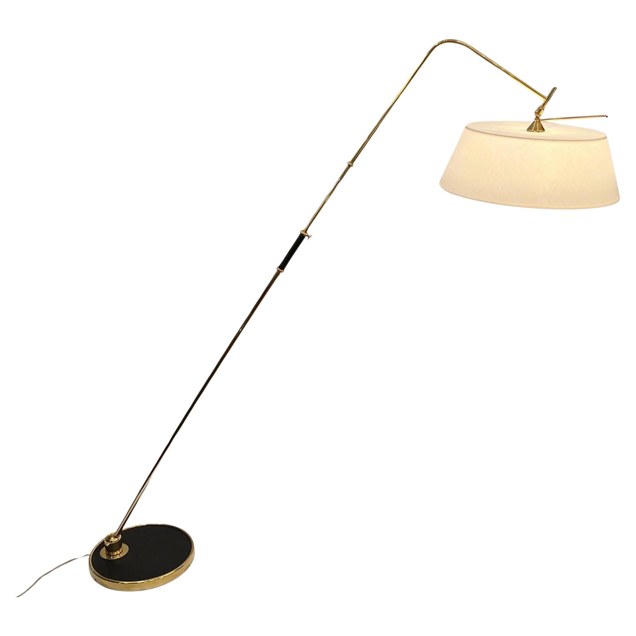 Adjustable and extendable floor lamp, by Maison Lunel, Paris, France, circa 1960