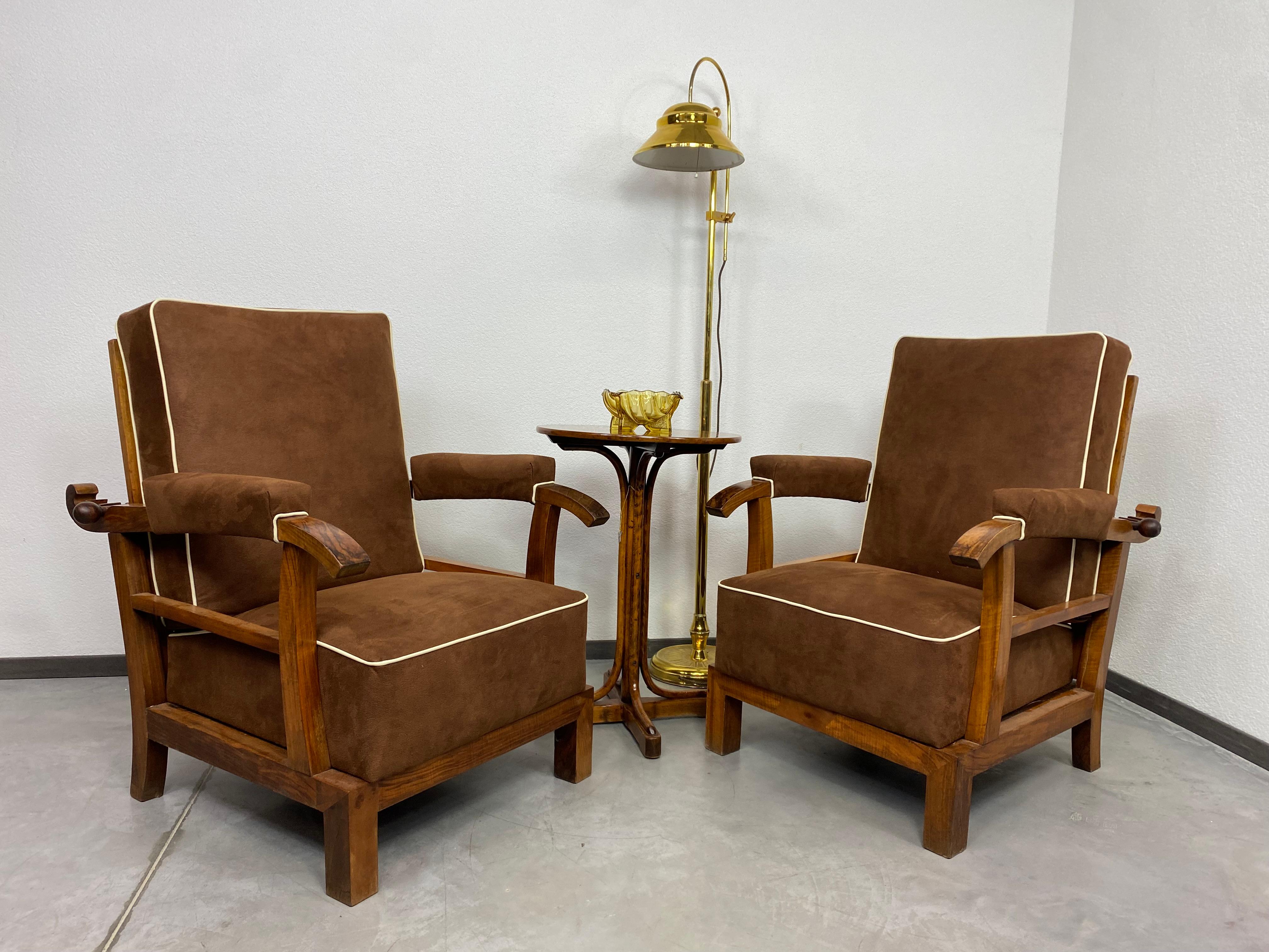 Adjustable art deco armchairs, completely restored with new fabric.