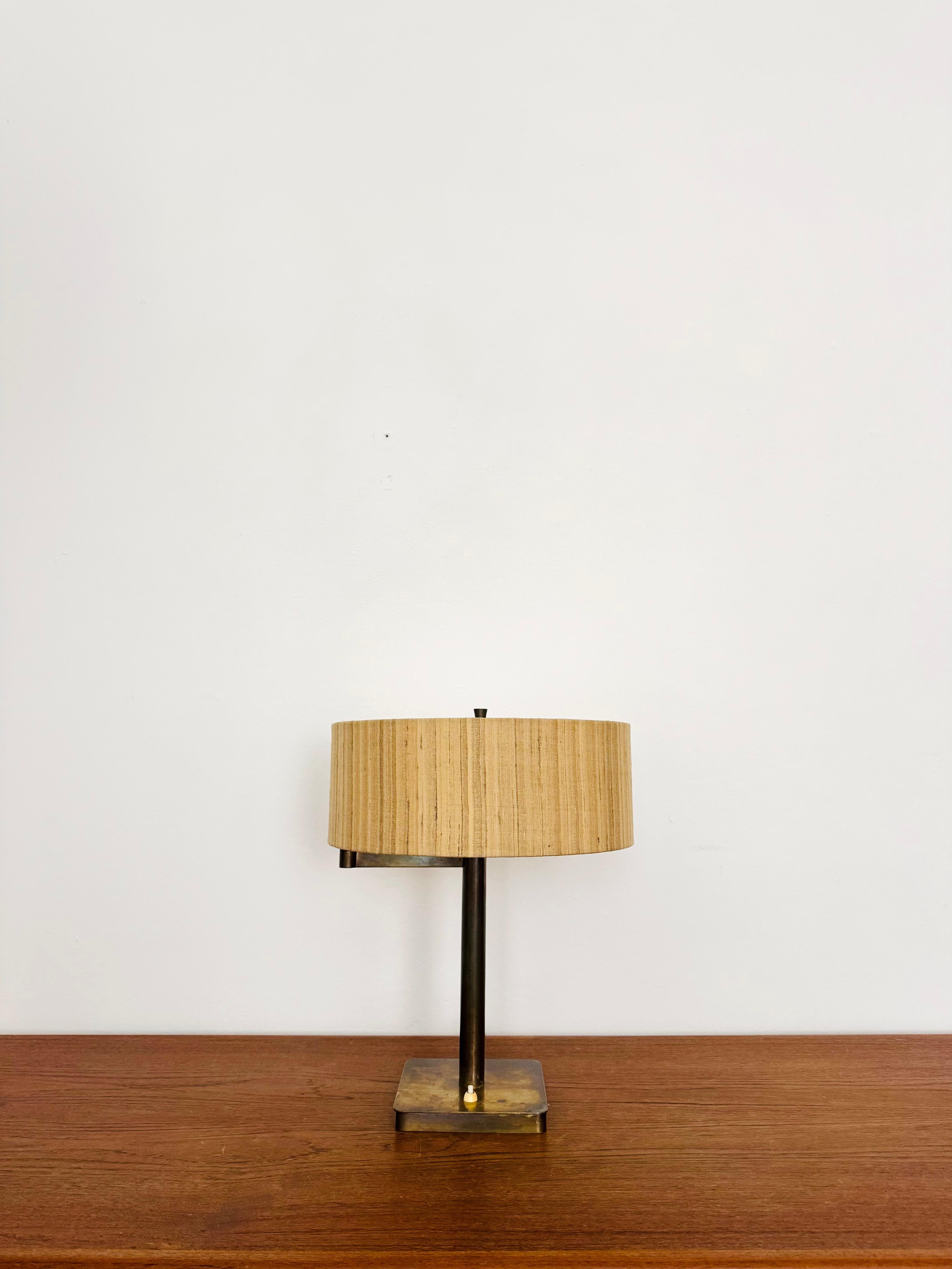 Wonderful table lamp from the 1920s.
Great and unusual design with a fantastically elegant appearance.
The wild silk lampshade creates a very cozy atmosphere.
The acrylic glass cover provides a sparkling effect.
The lampshade can be adjusted as