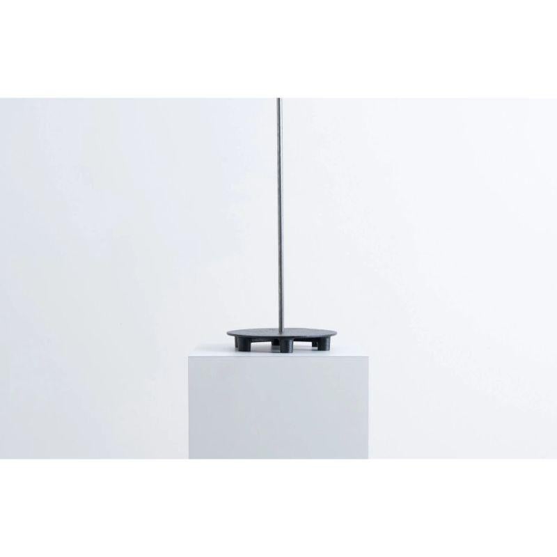 Let this slim steel floor lamp rest behind a chair or sofa in a lounge arrangement, position it amongst plants in your bedroom, or swivel its warm globe across the edge of a desk in your workspace for an added flair of Art Deco style. 

This