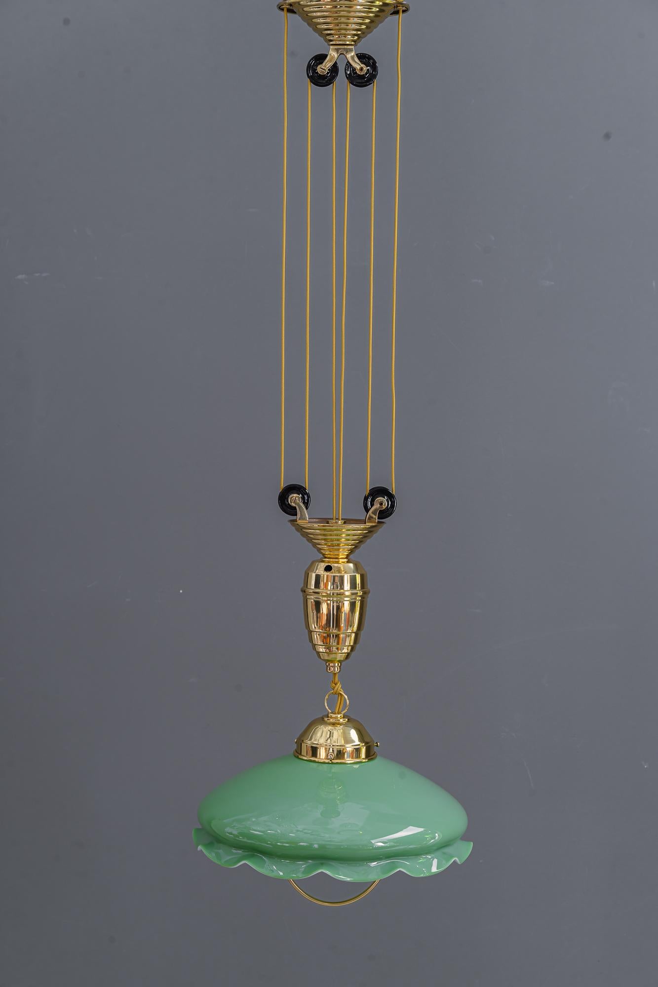 Adjustable art deco pendant vienna with original opaline glass shade 1920s
Original glass shade
Adjustable from 94 - 180cm
Middle position: 114cm