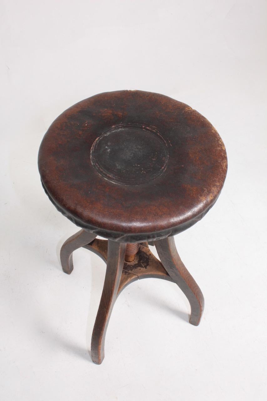Danish Adjustable Artist Stool in Oak and Patinated Leather, Denmark, 1930s