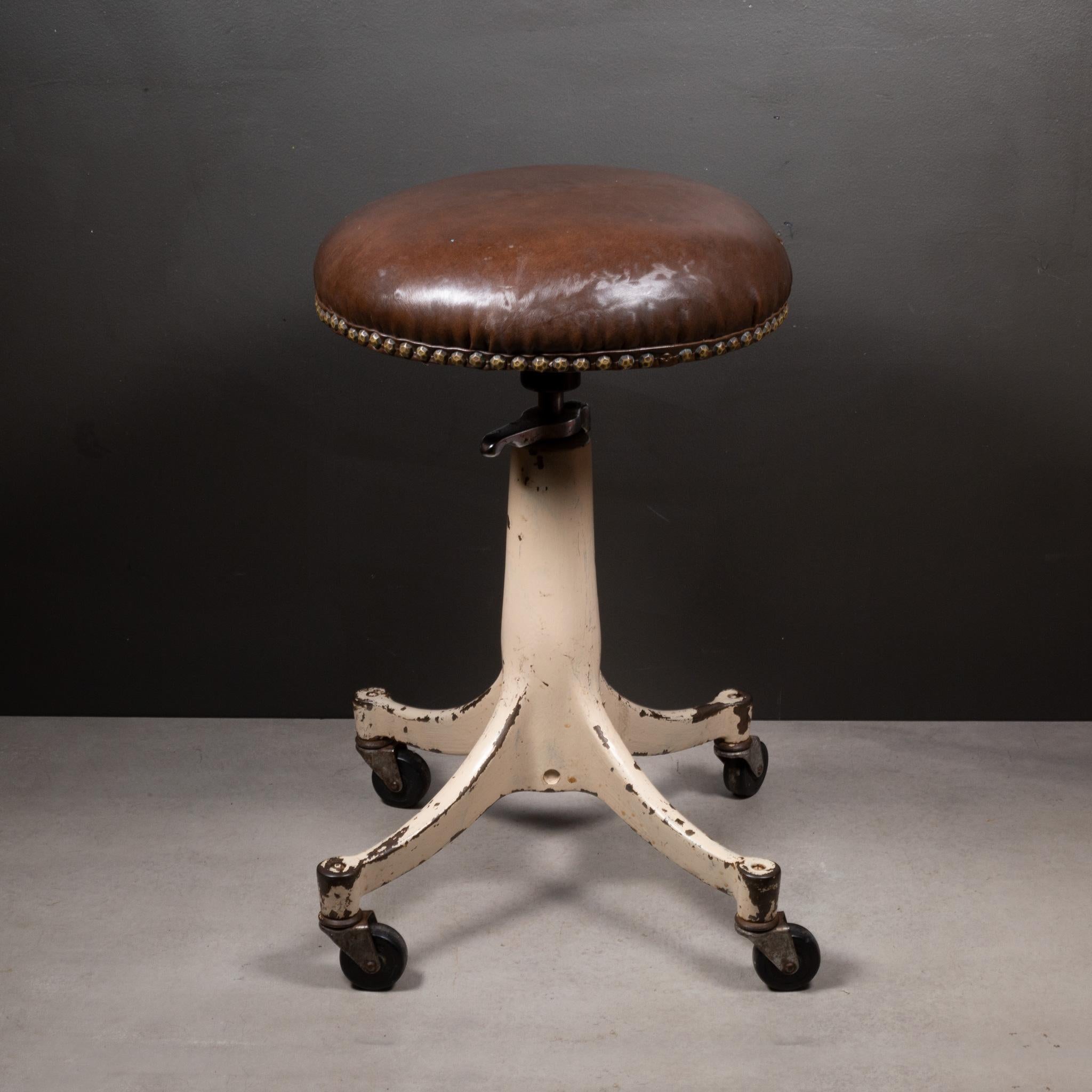 ABOUT

An adjustable, Bausch & Lomb Optometrist stool on cast iron base with casters. Original brown swivel vinyl seat with brass tacks. The height is easily adjusted by simply raising the seat and lowering by releasing the chrome handle. Glides
