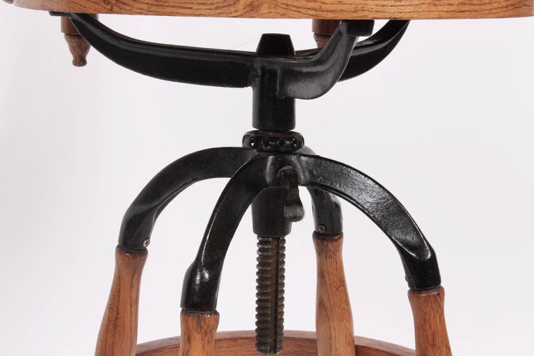 Bentwood High Back Oak and Cast Iron Adjustable Architects Swivel Chair