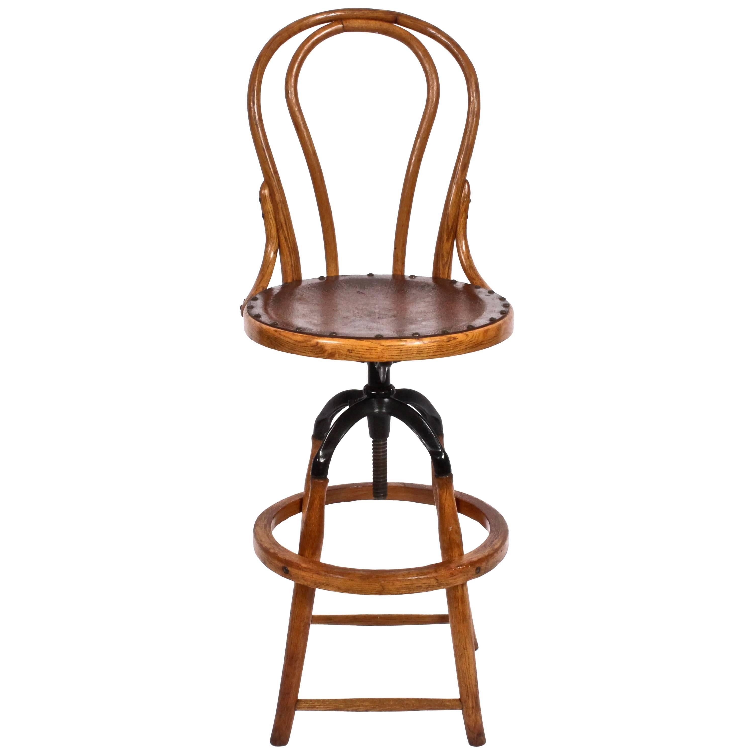  Circa 1910 Adjustable High Back Swivel Chair in Oak Bentwood and Cast Iron