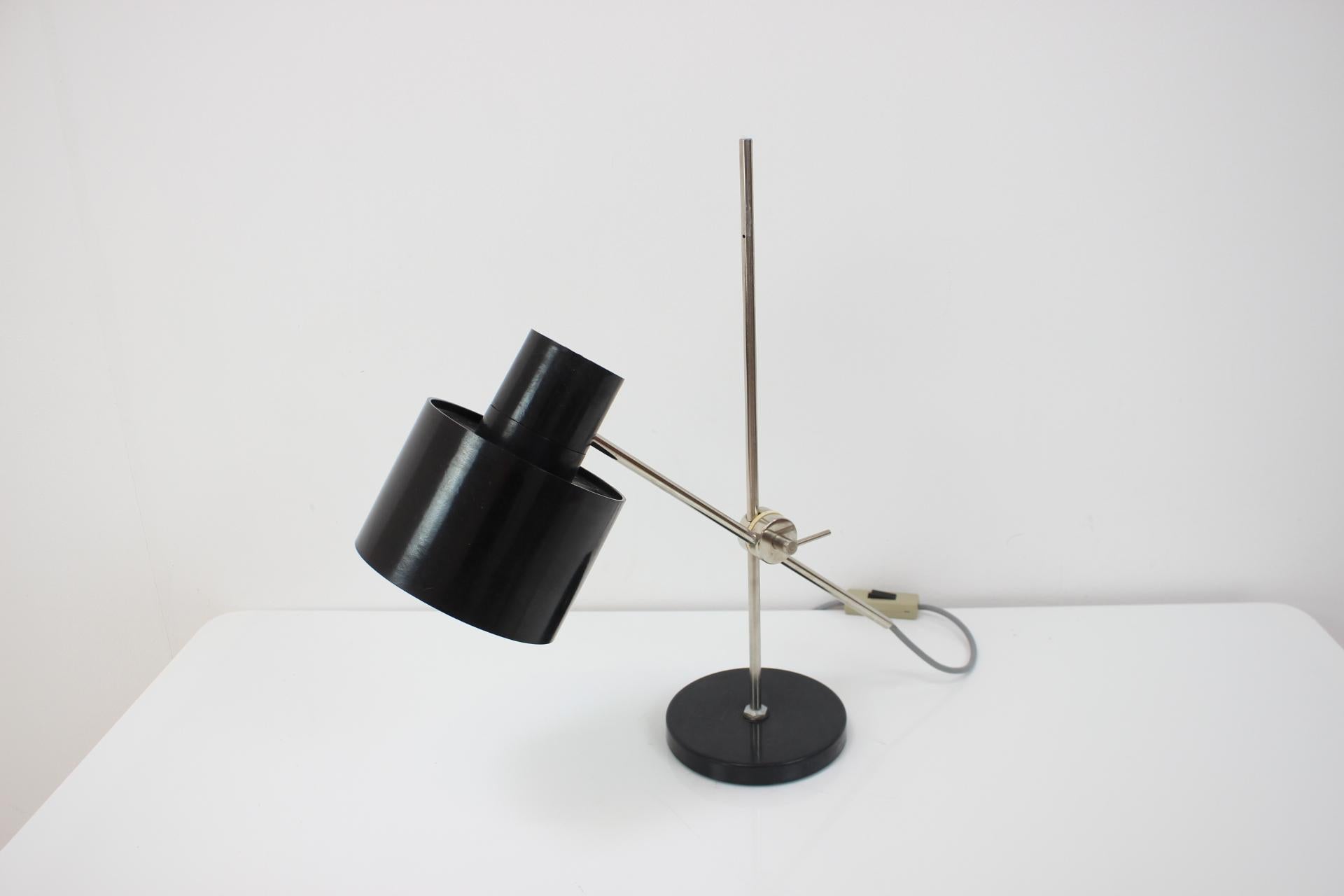 Metal Adjustable Black Bakelite Industrial Table Lamp / Czechoslovakia, 1970s For Sale