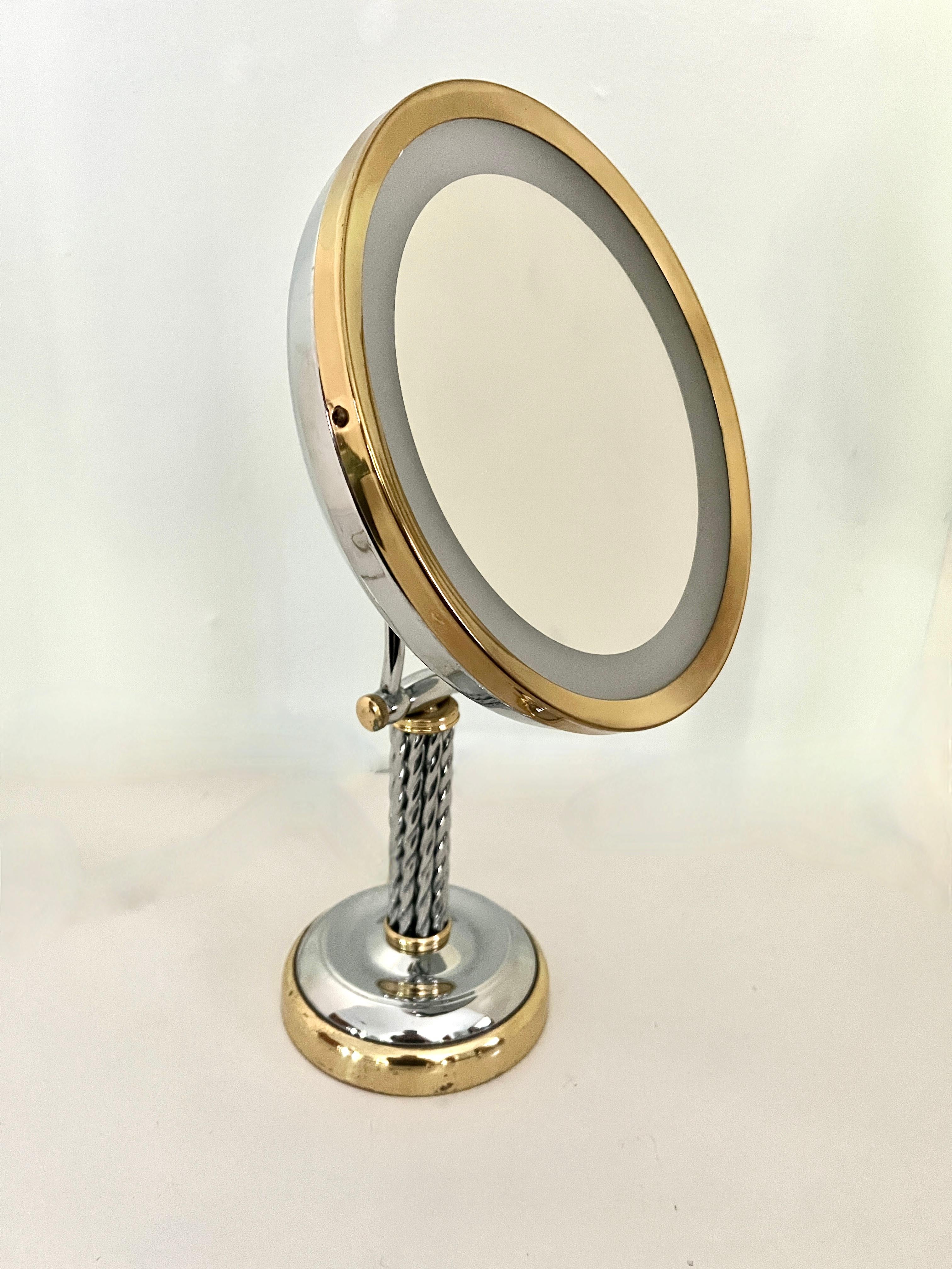 Polished Adjustable Braided Chrome Handle and Brass Lighted  Magnification Table Mirror For Sale