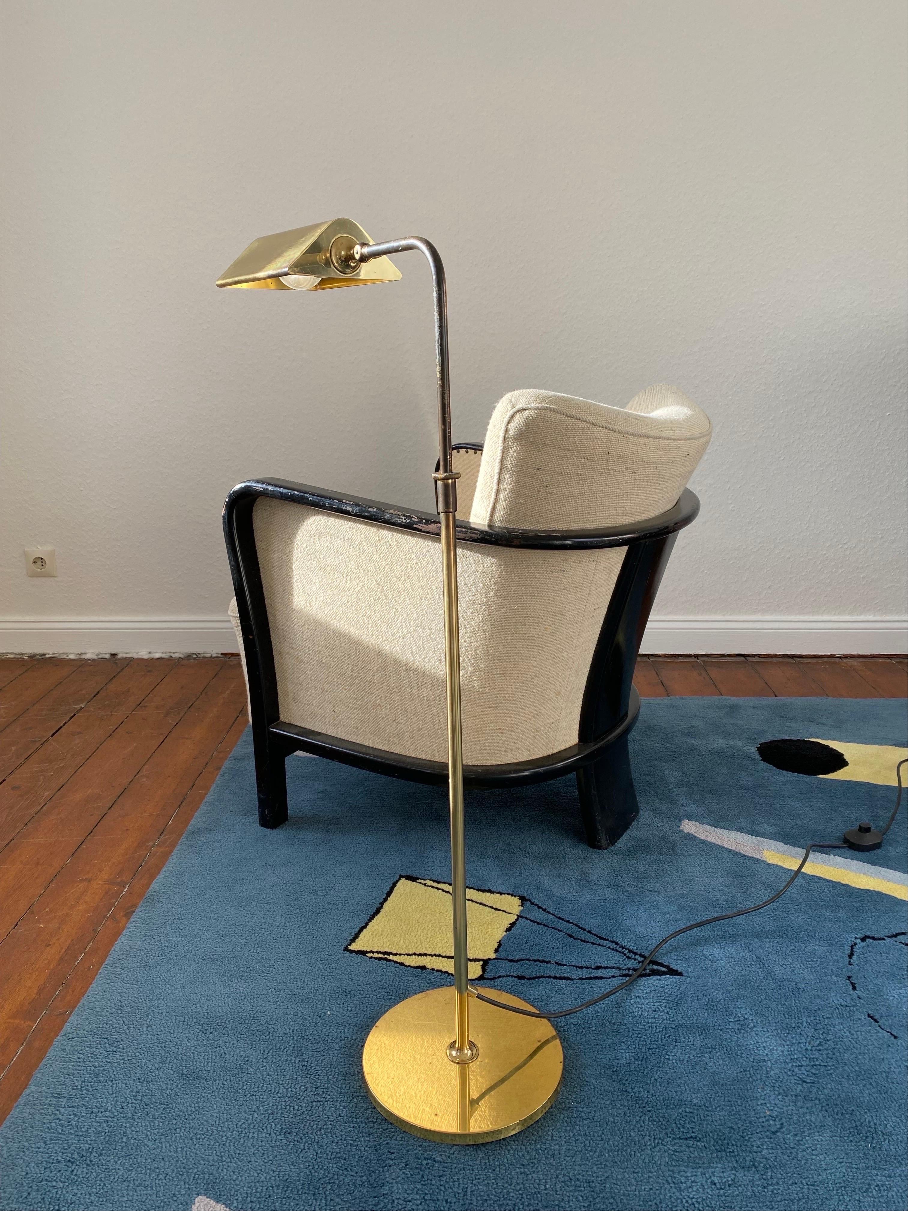 An Adjustable Brass 1970s high quality reading floor lamp ,model : Cervantes by Florian Schulz,Germany.

With its beautiful partly bronzed patinated finish this adjustable lamp has a height from 85 cm to 135 cm max .
Also the light direction can
