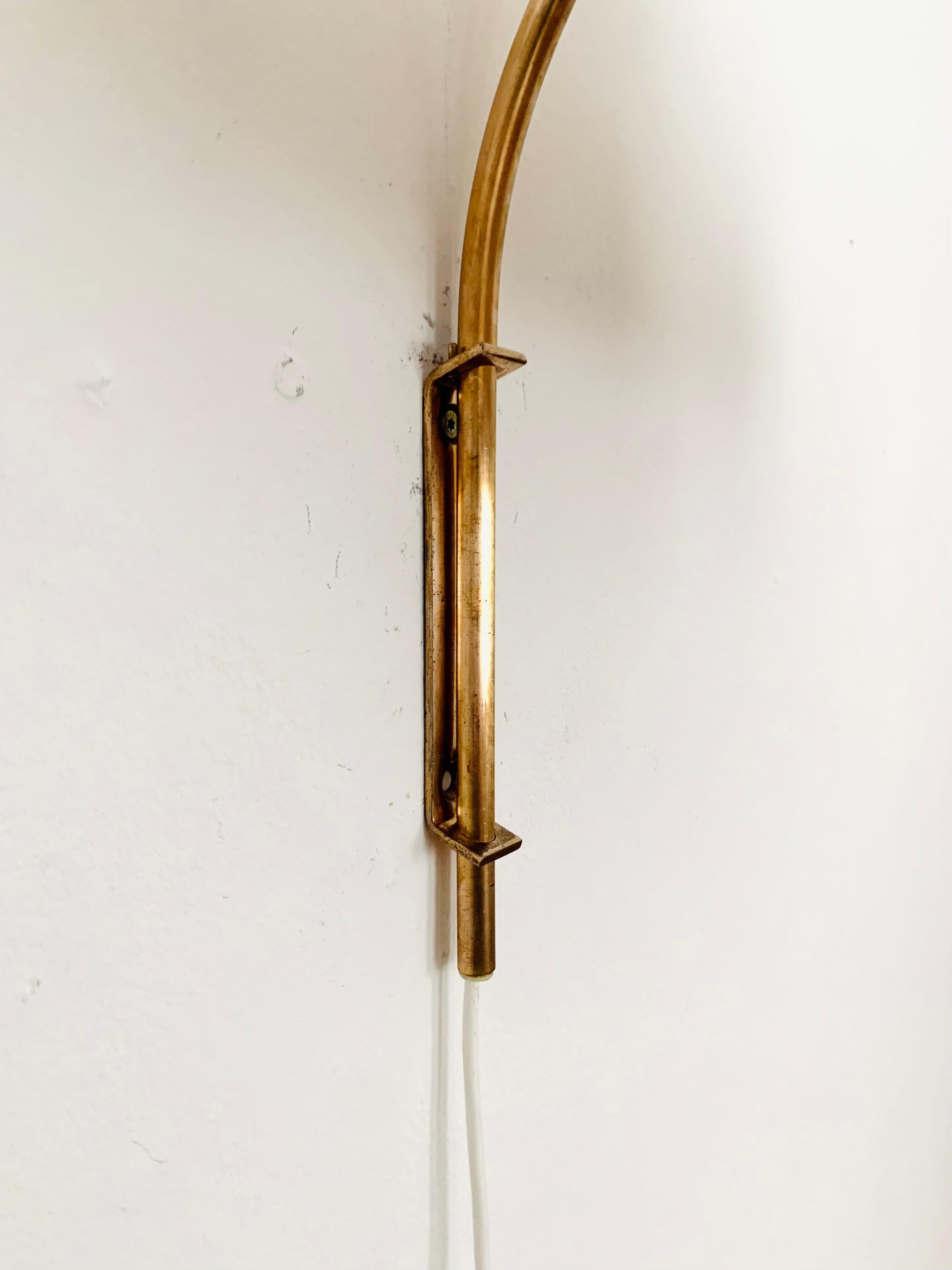 Adjustable Brass and Wicker Arc Sconce 4