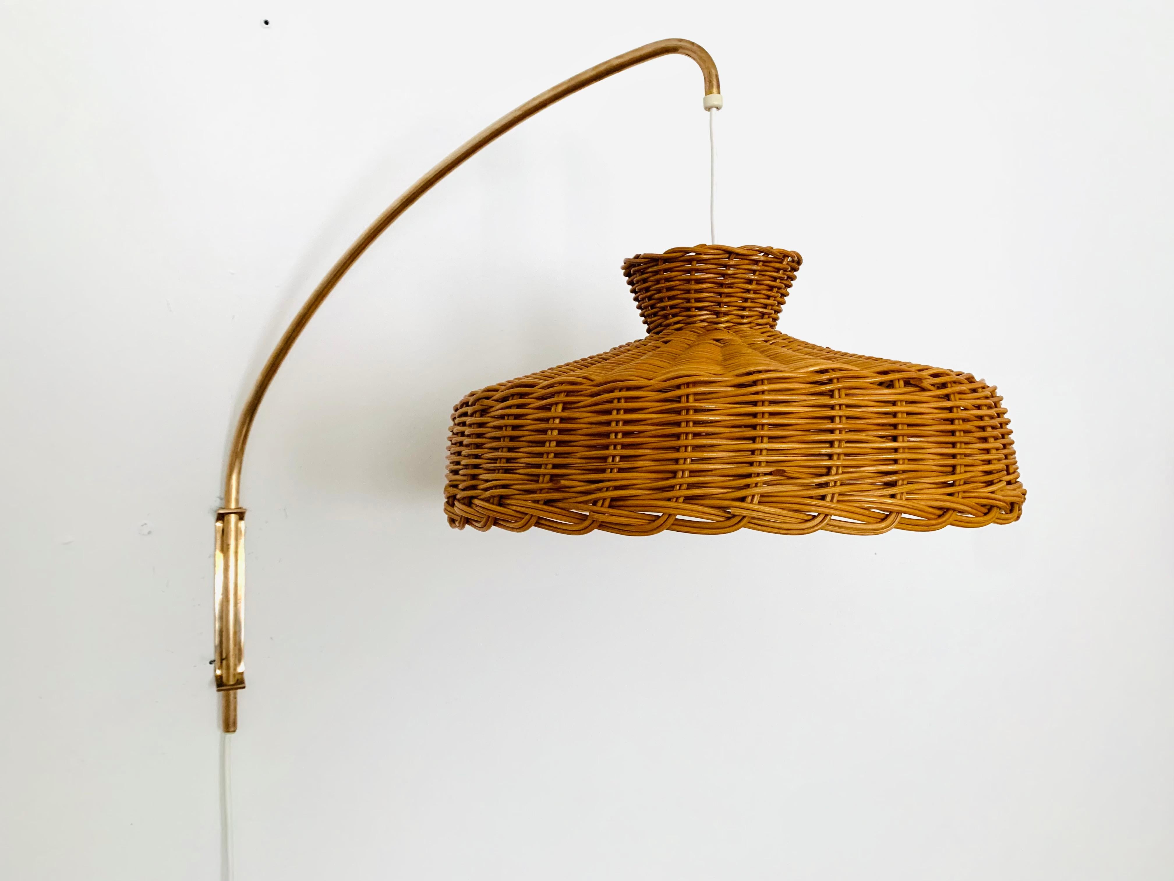 Adjustable Brass and Wicker Arc Sconce In Good Condition In München, DE