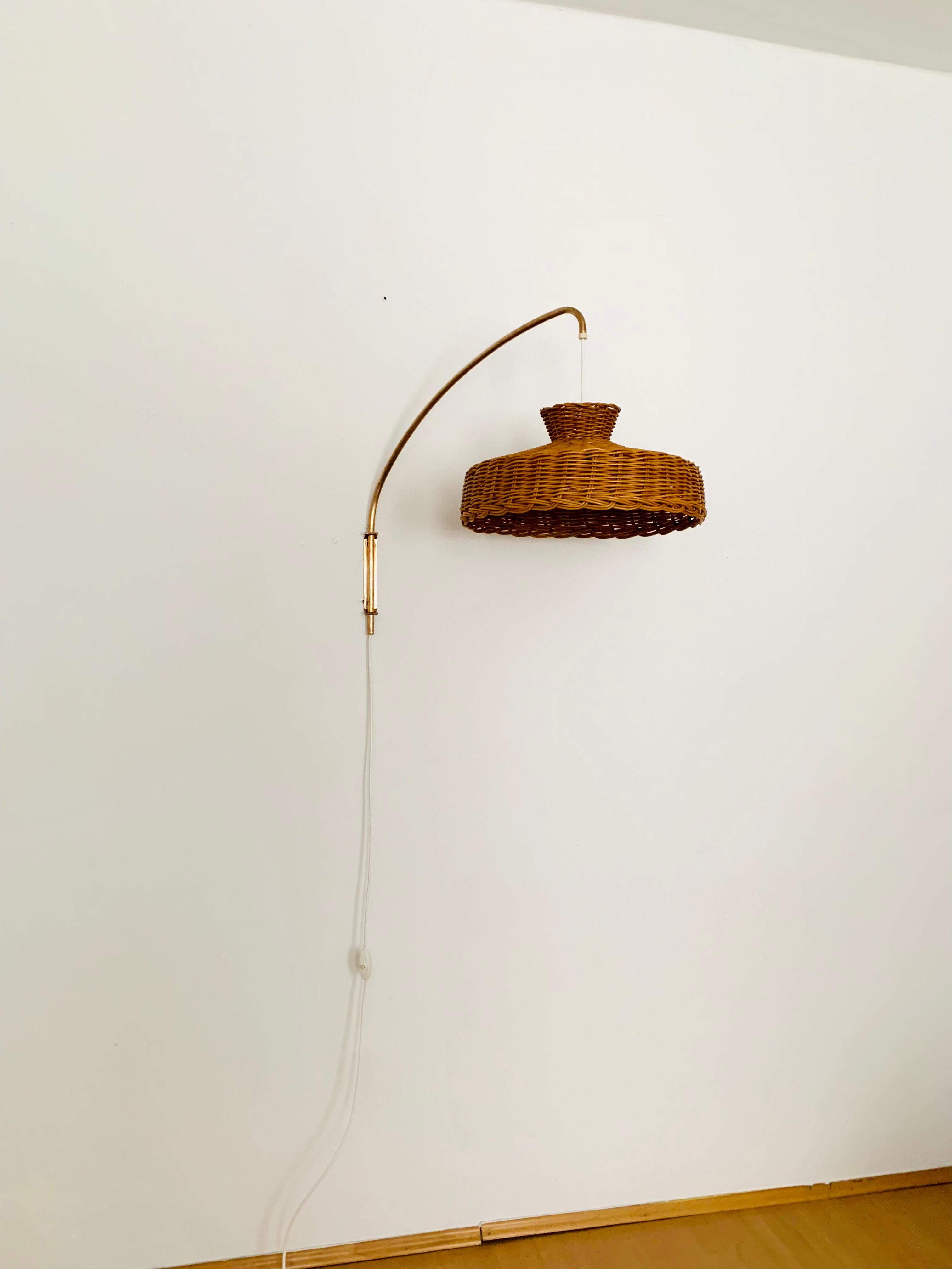 Mid-20th Century Adjustable Brass and Wicker Arc Sconce