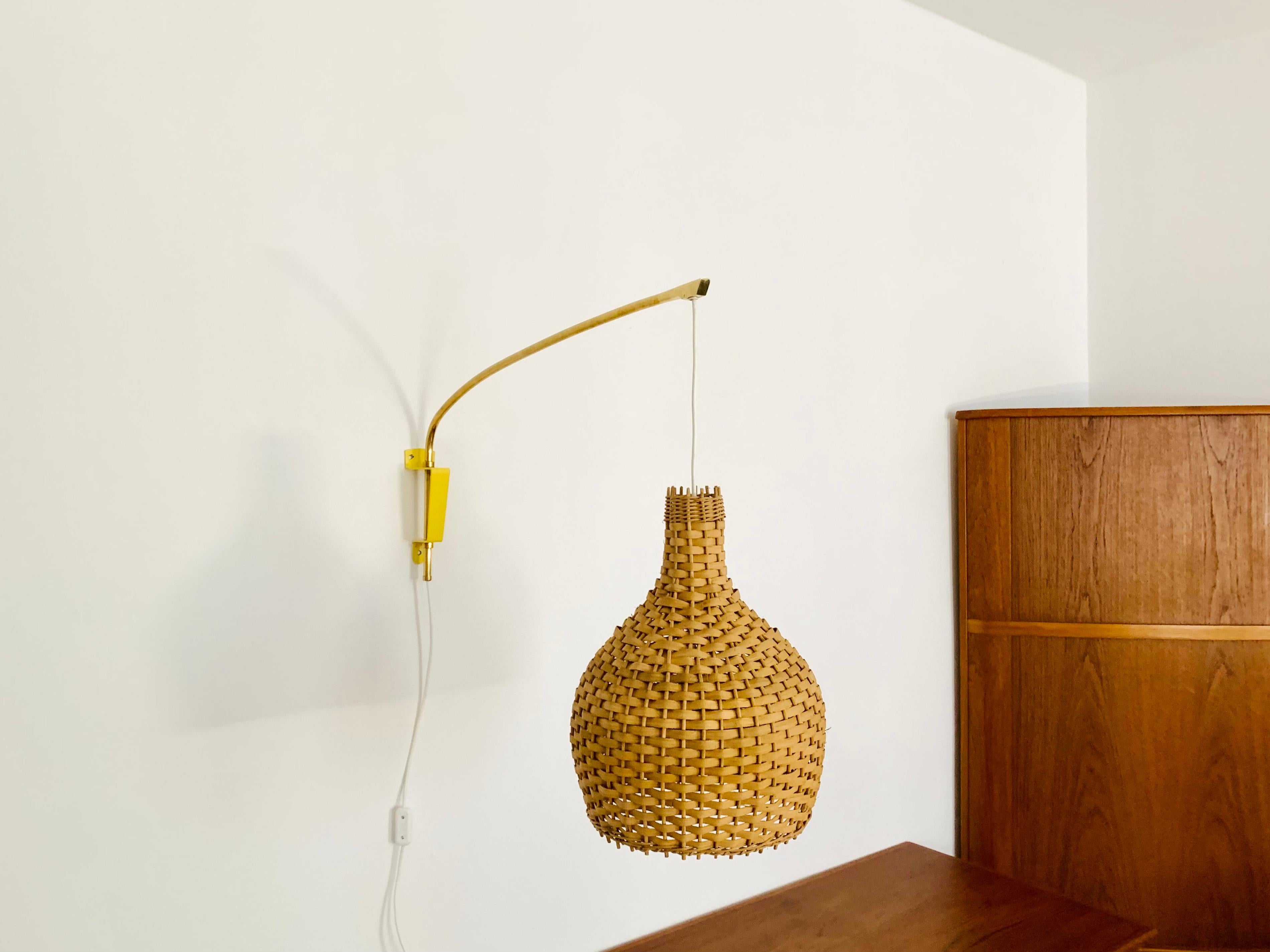 Mid-20th Century Adjustable Brass and Wicker Arc Sconce For Sale