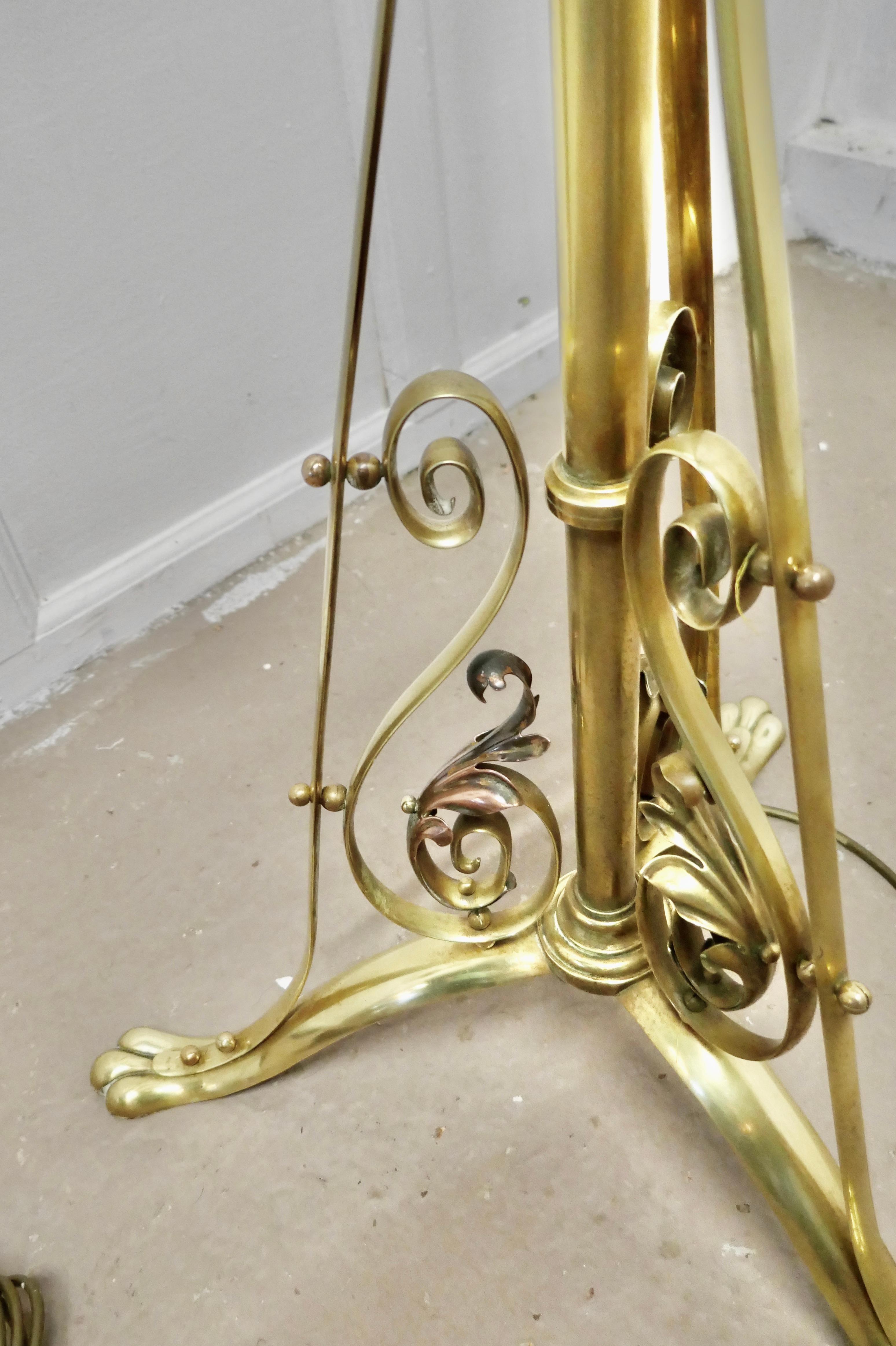 Adjustable brass floor lamp in the Arts & Crafts style

This is a very attractive piece, the lamp has a telescopic action and a decorative wrought brass base, the upright can be extended to raise the height of the lamp

The lamp has relatively
