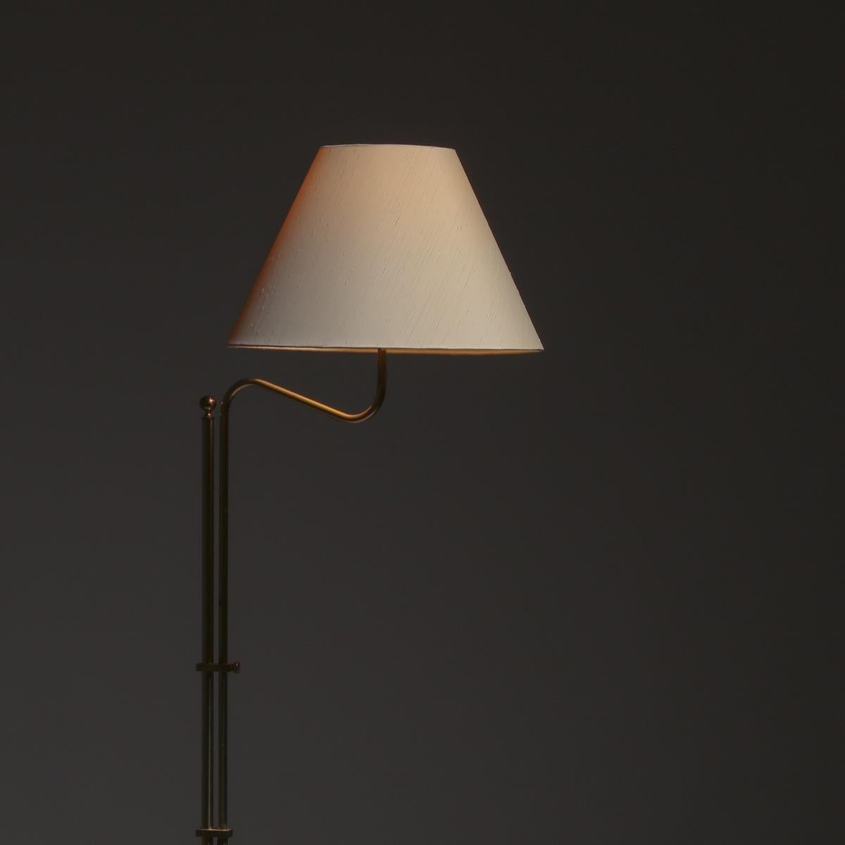 Scandinavian Modern Adjustable Brass Floor Lamp Model G132 by Bergboms, Sweden, 1970s For Sale