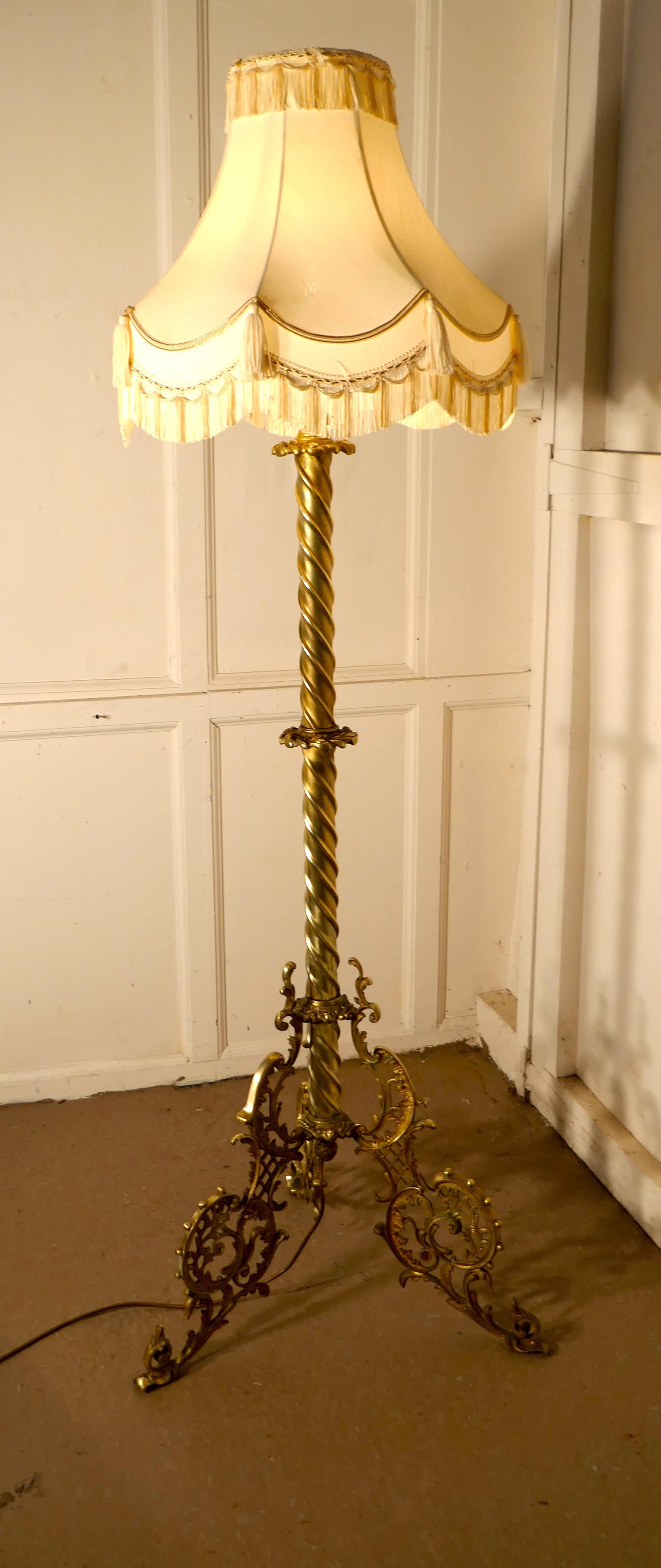 Adjustable brass floor lamp rococo standard lamp

This is a very attractive piece, the lamp has a telescopic action, with a decorative wrought brass base and a rope twisted upright that can be extended to raise the height of the lamp
I have shown