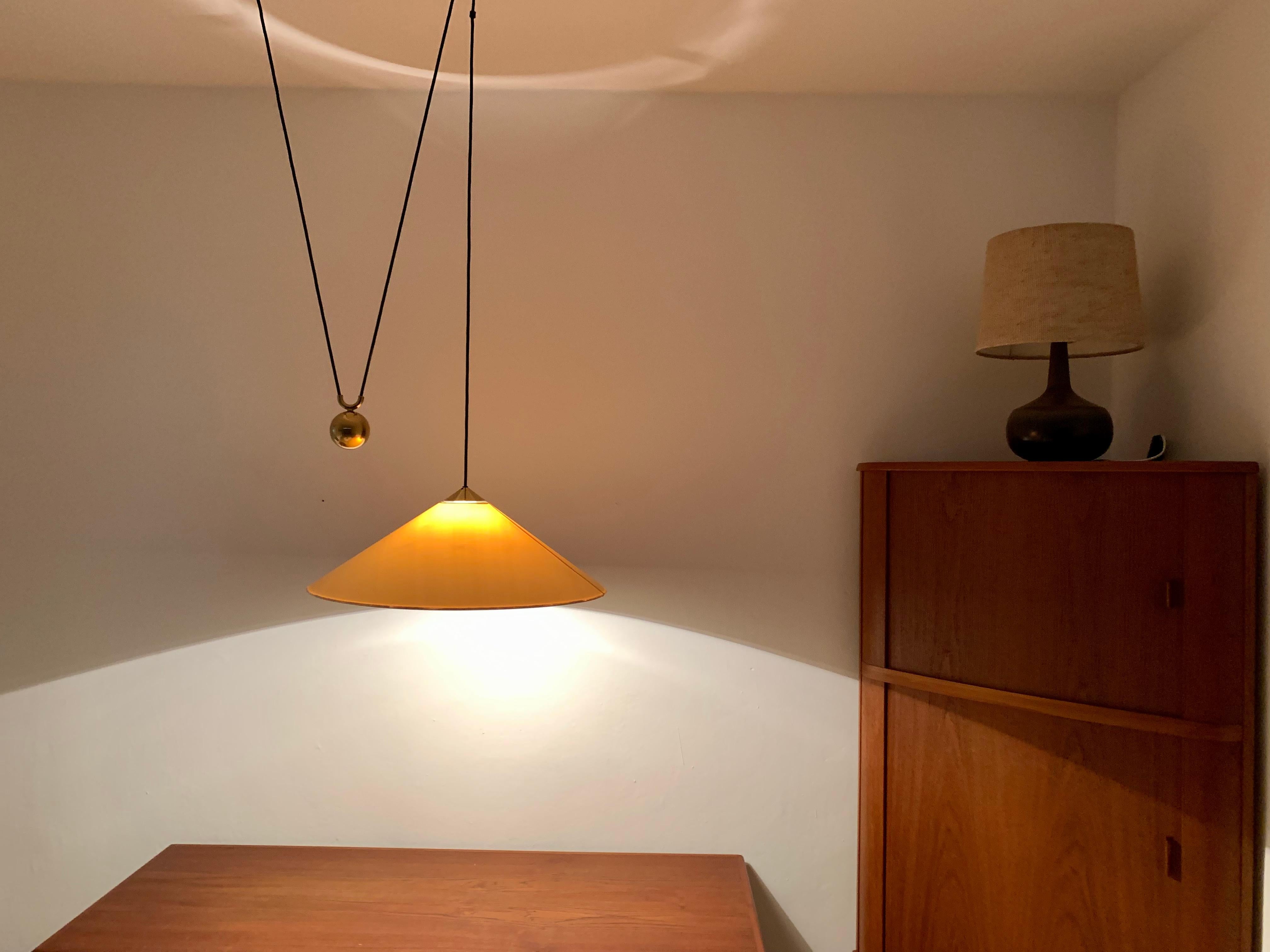 Adjustable Brass Pendant Lamp with Counterweight by Florian Schulz For Sale 4
