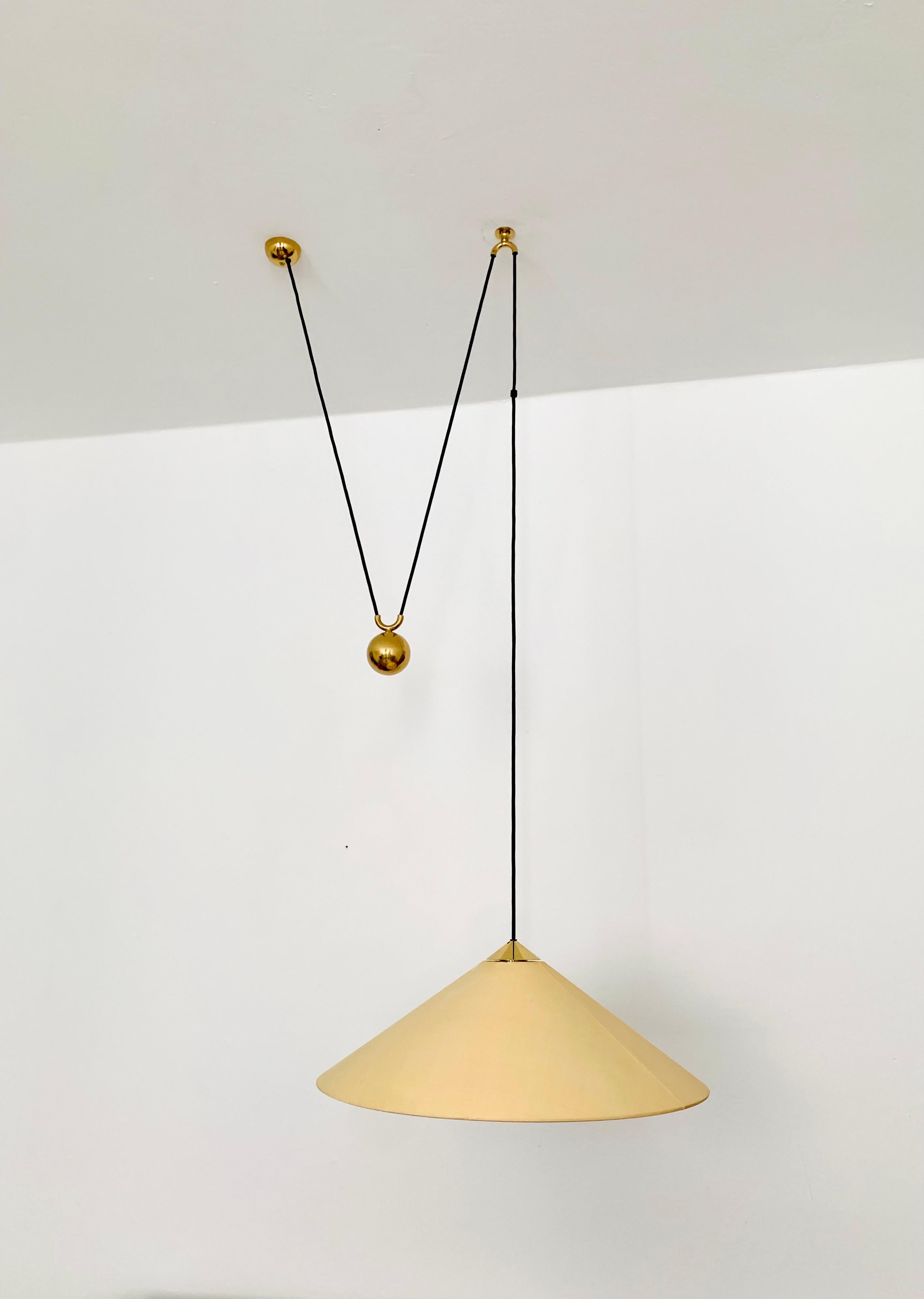 Mid-Century Modern Adjustable Brass Pendant Lamp with Counterweight by Florian Schulz For Sale
