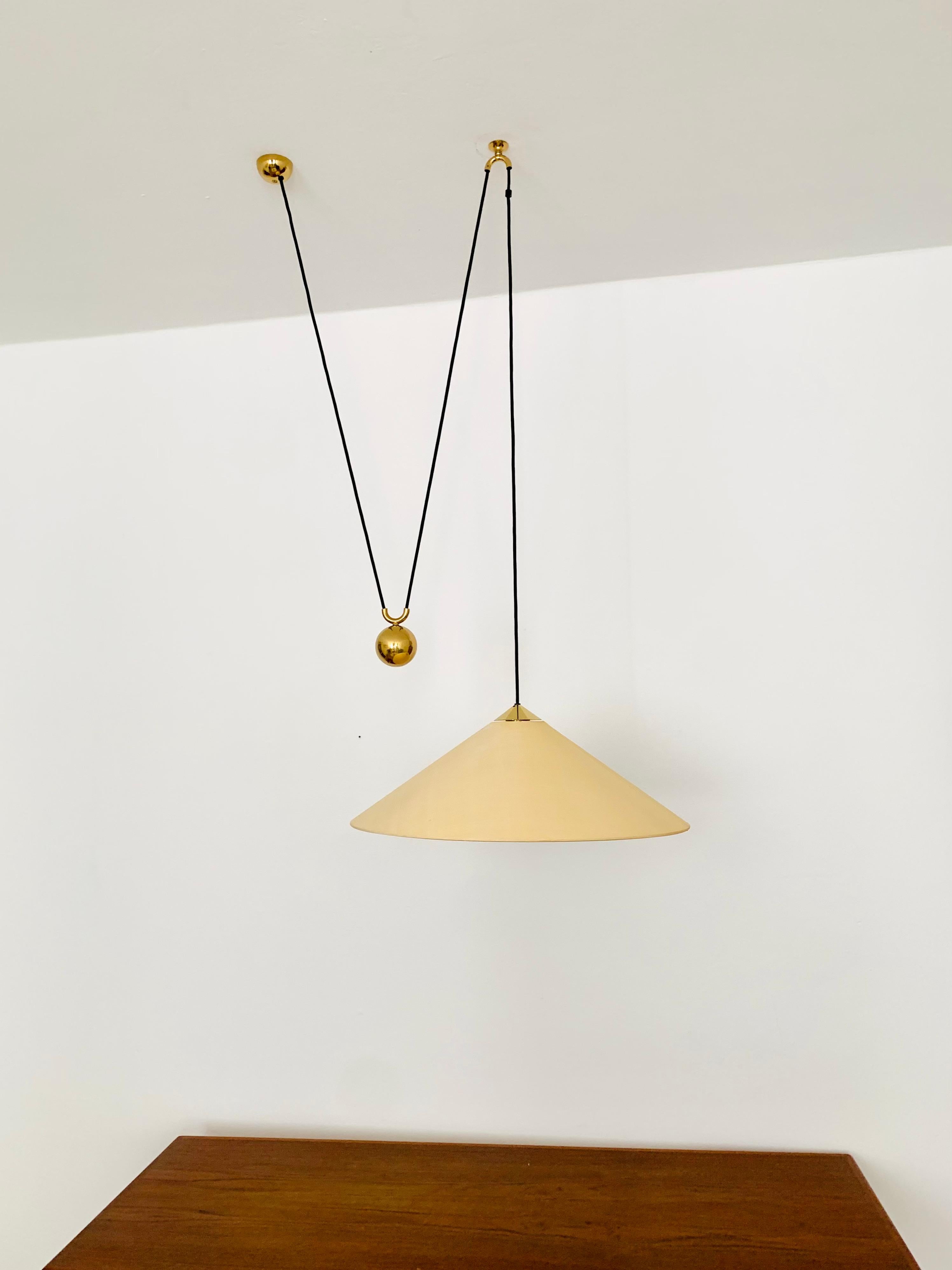 German Adjustable Brass Pendant Lamp with Counterweight by Florian Schulz For Sale