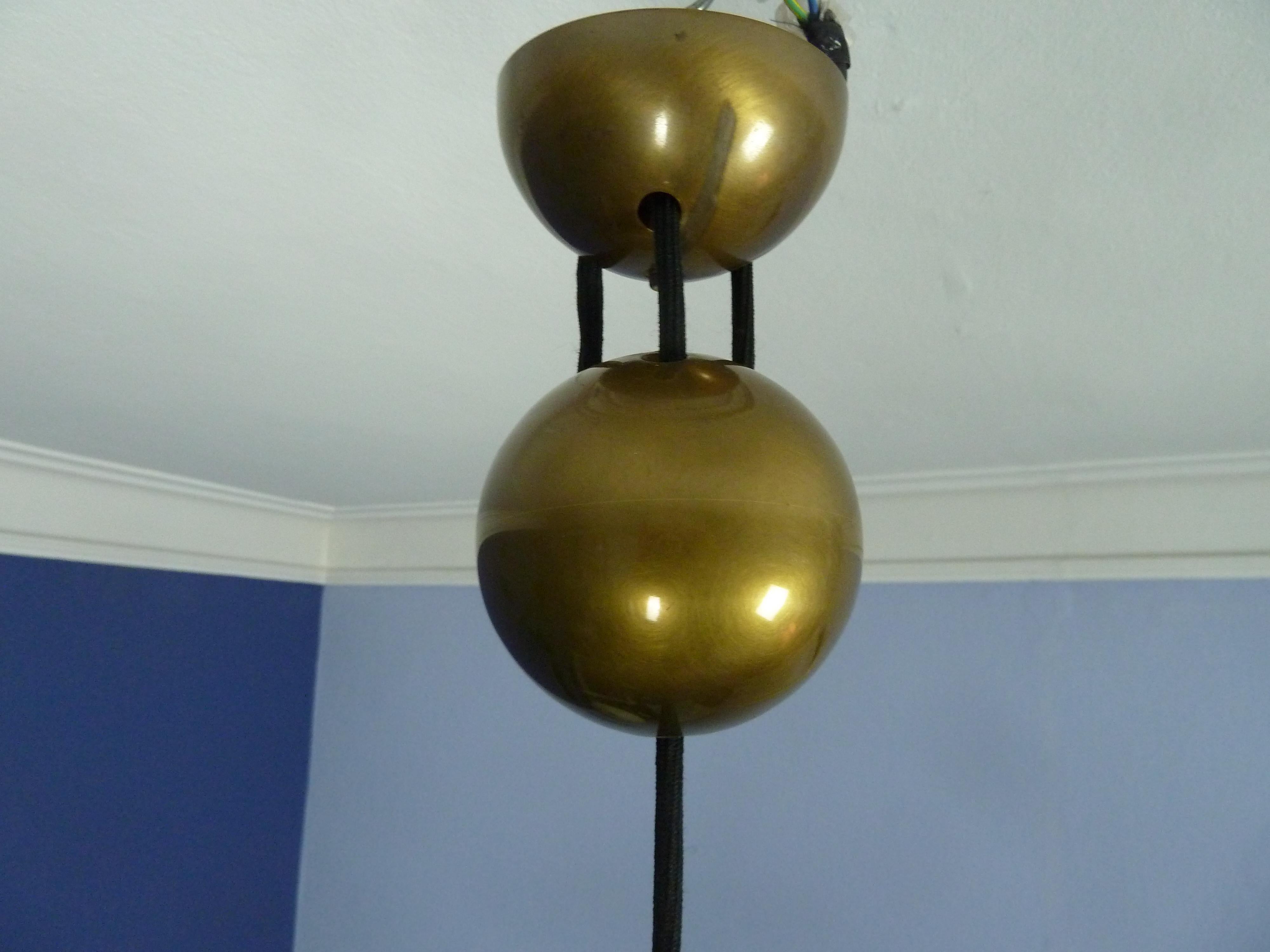 Adjustable Brass Pendant Onos55 by Florian Schulz with a Central Counterweight 3