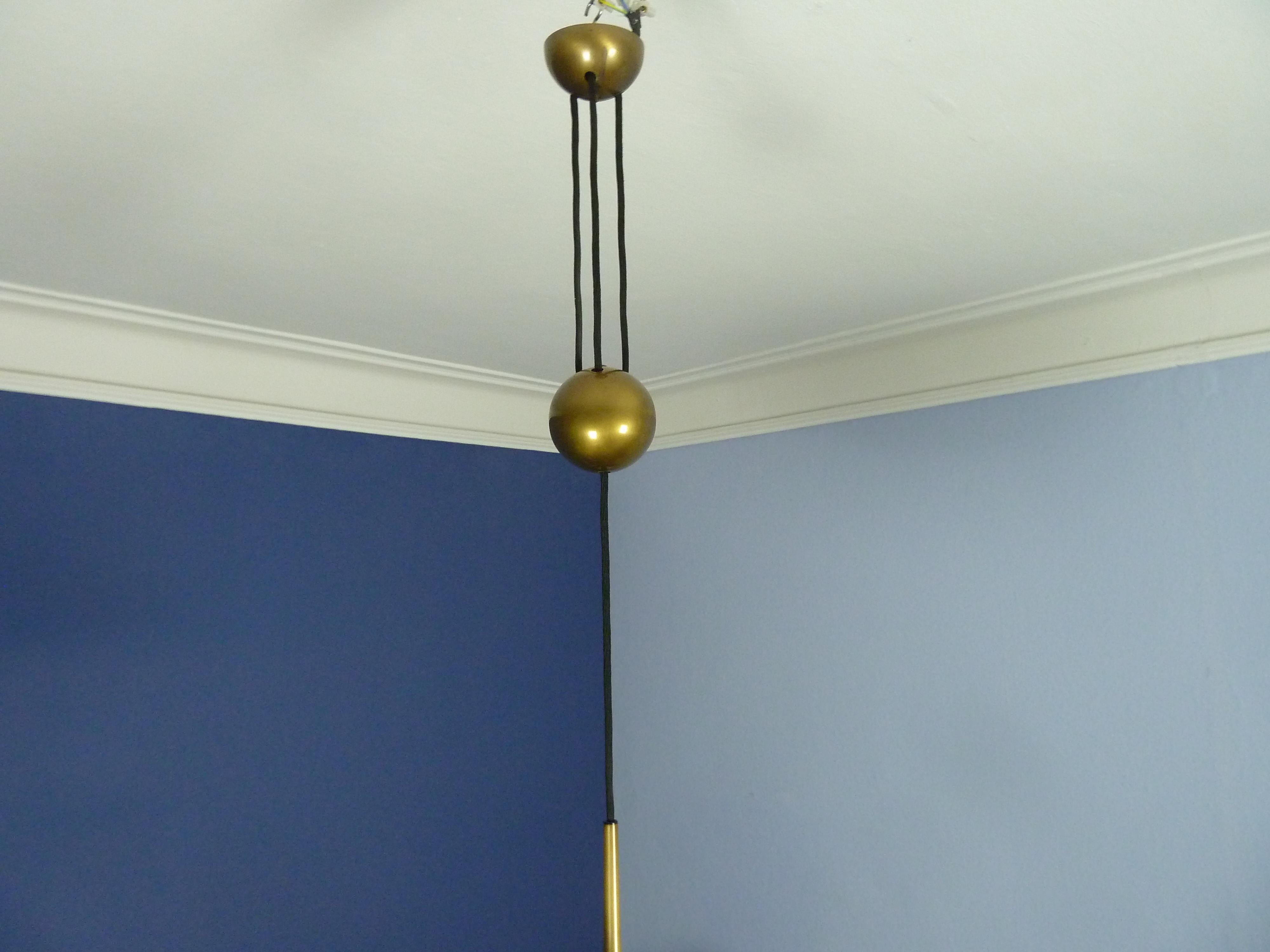 Adjustable Brass Pendant Onos55 by Florian Schulz with a Central Counterweight 1