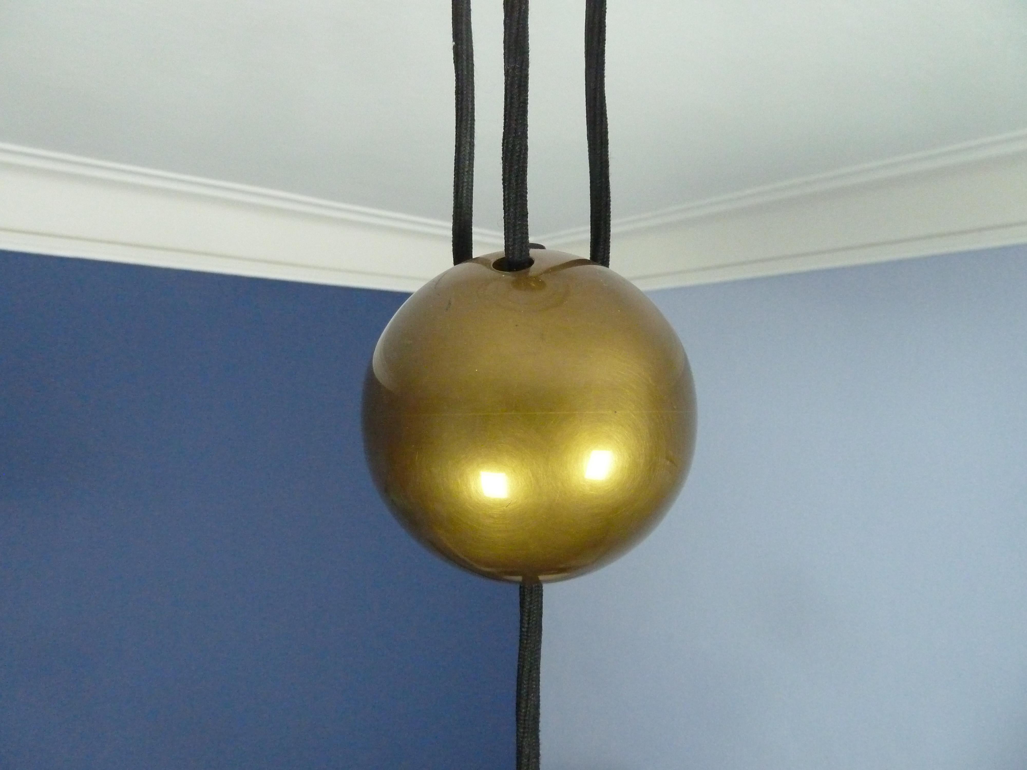 Adjustable Brass Pendant Onos55 by Florian Schulz with a Central Counterweight 2