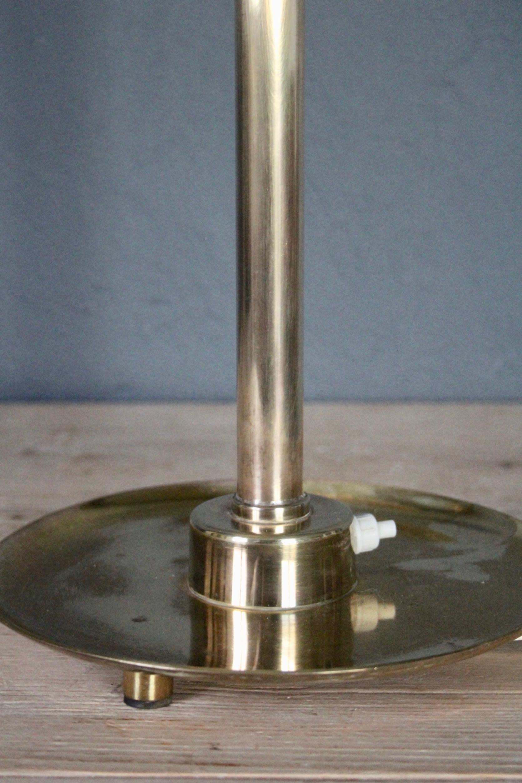 European Adjustable brass table lamp For Sale
