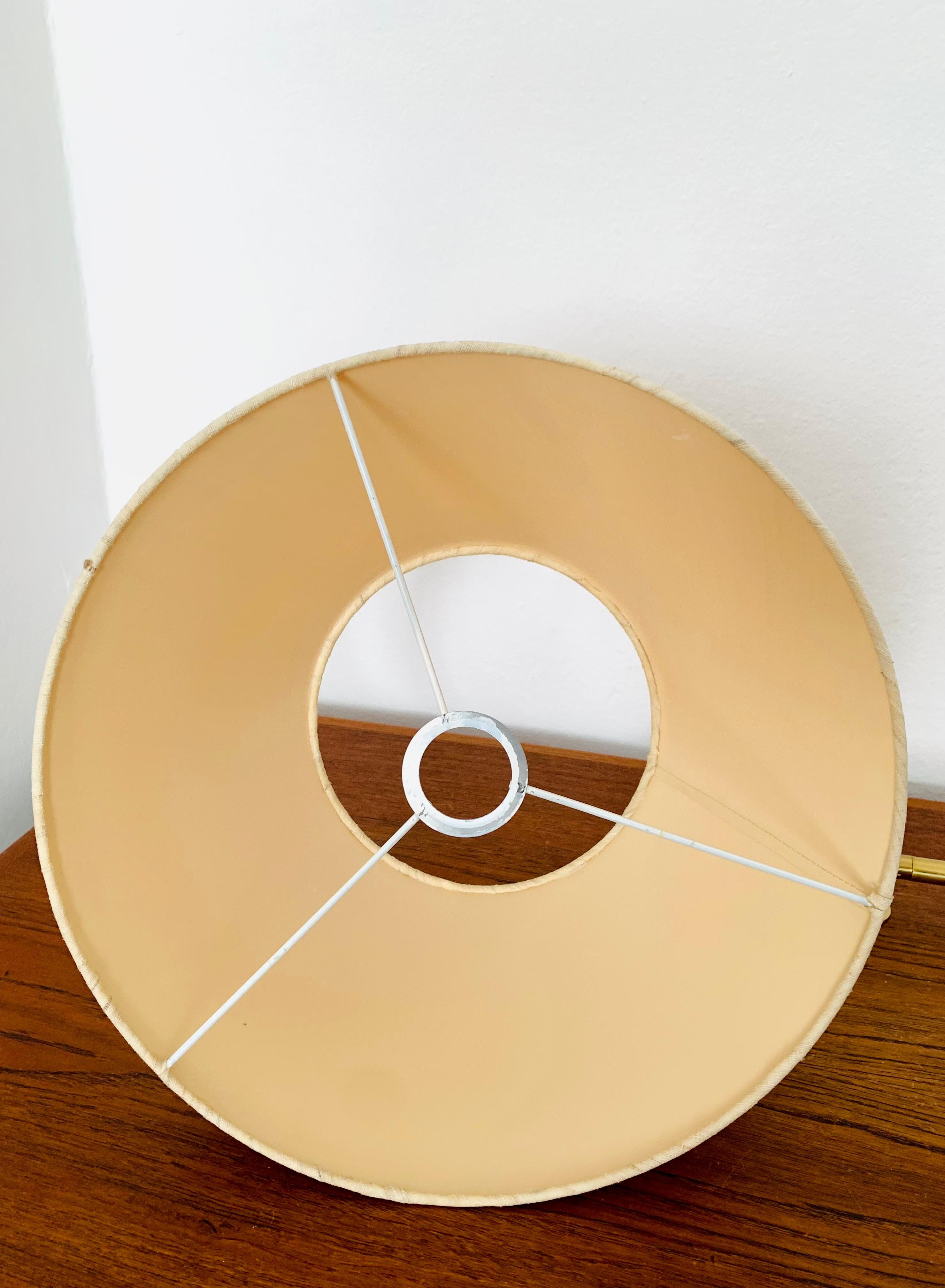 Adjustable Brass Wall Lamp by Florian Schulz For Sale 12