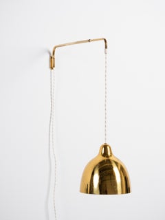 Verstellbare Wandleuchte aus Messing von Lisa Johansson-Pape für Orno, Finnland, 1950er Jahre