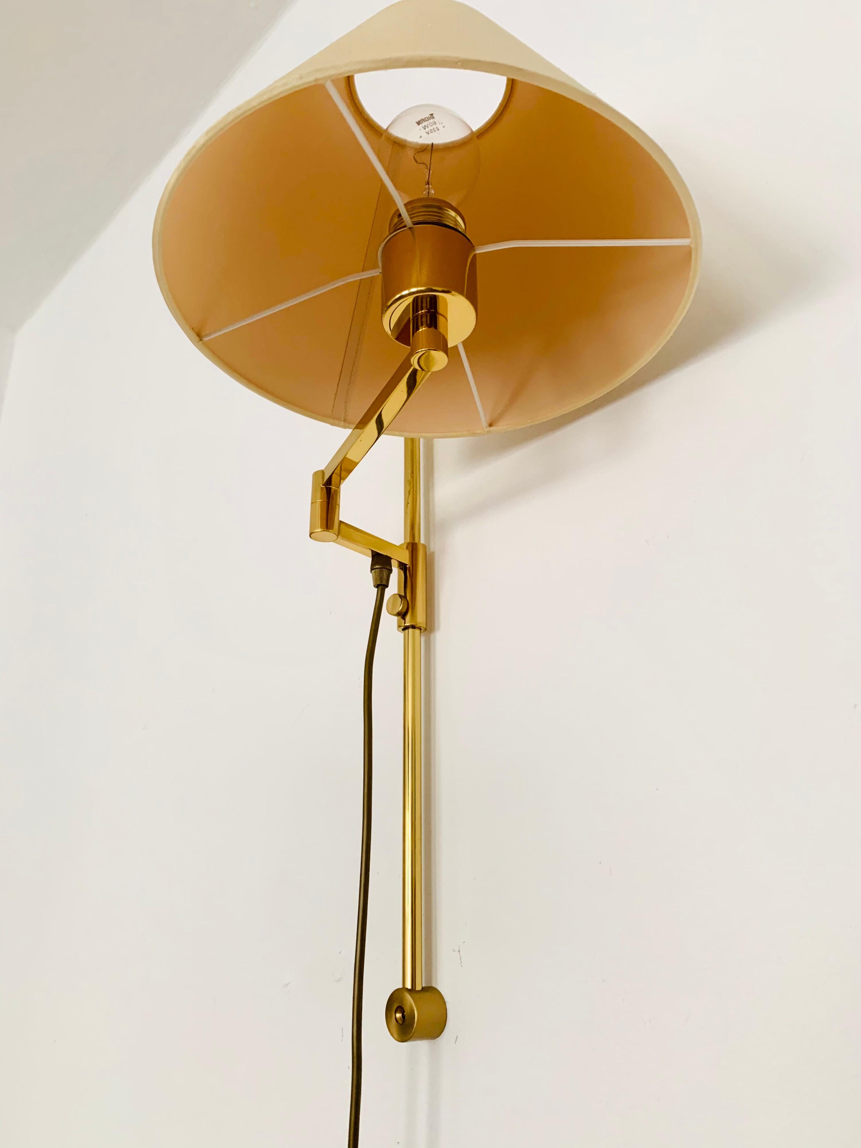 Mid-20th Century Adjustable Brass Wall Lamp For Sale