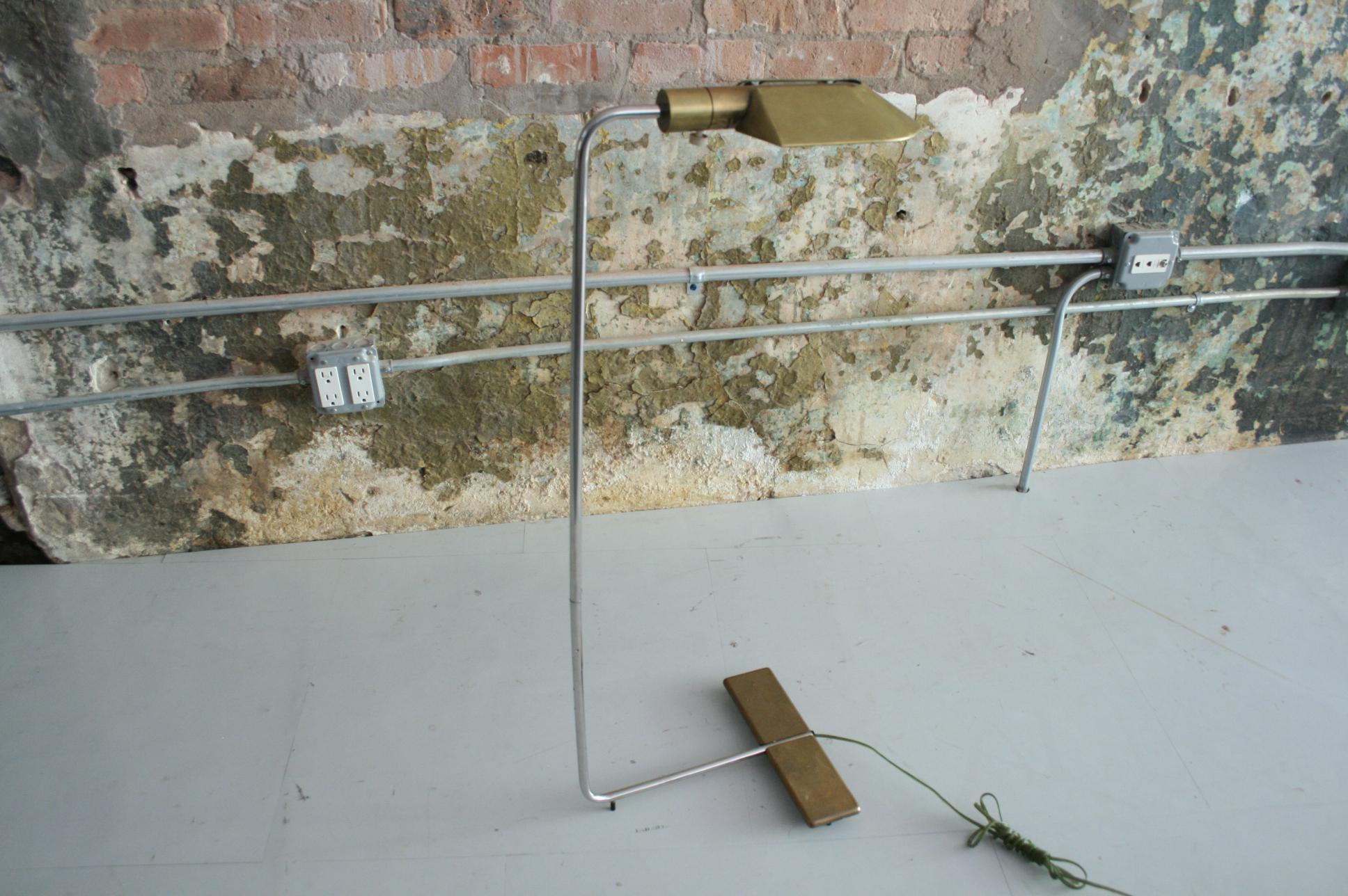 Patinated brass and chrome stand floor lamp by Cedric Hartman. The 