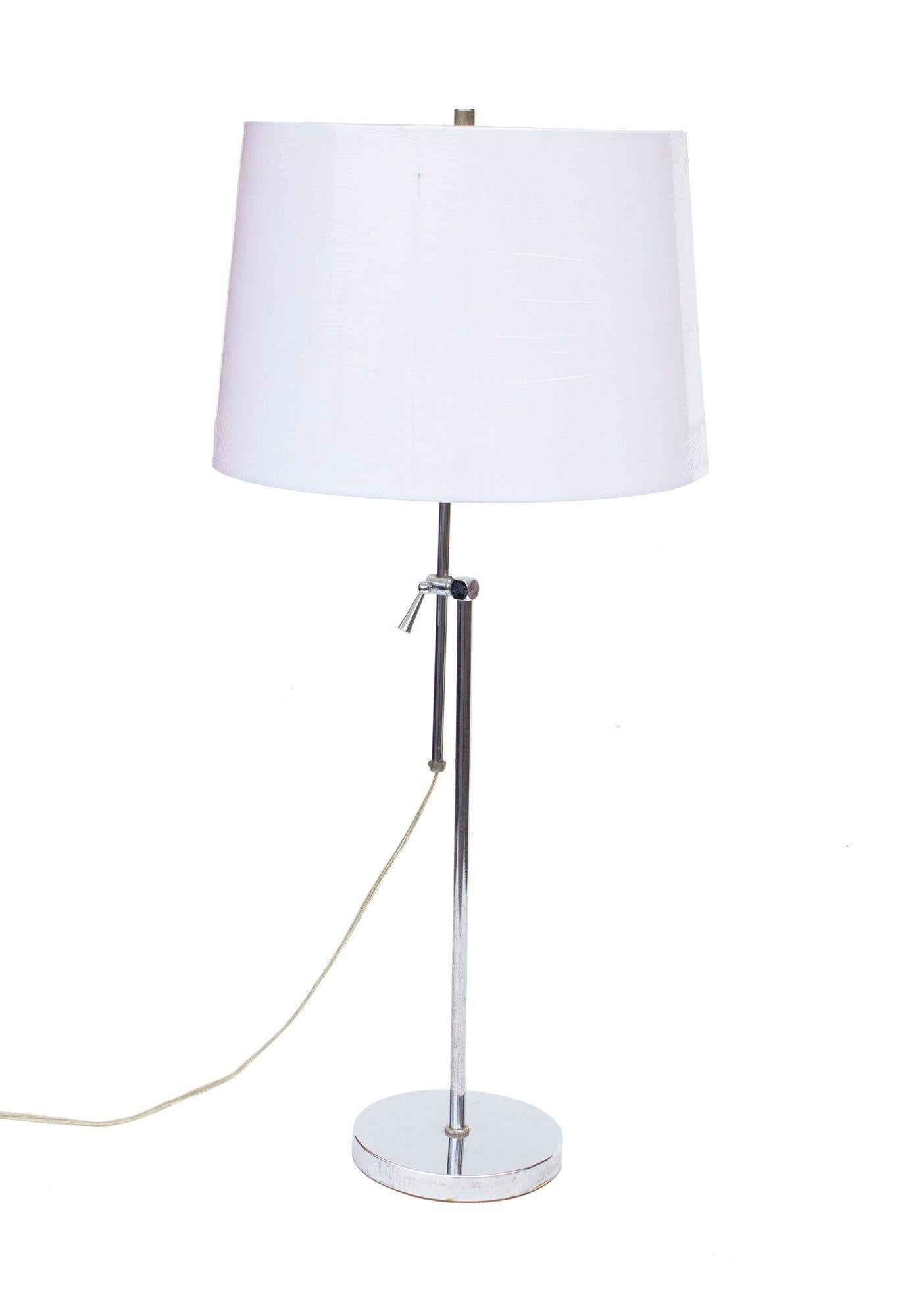 USA, 1970s

Matching chrome floor lamp and table lamp set. These are both height adjustable by telescoping the two vertical parts up or down. Excellent quality and a very versatile set. No maker's marks, quality American made pieces.

CONDITION