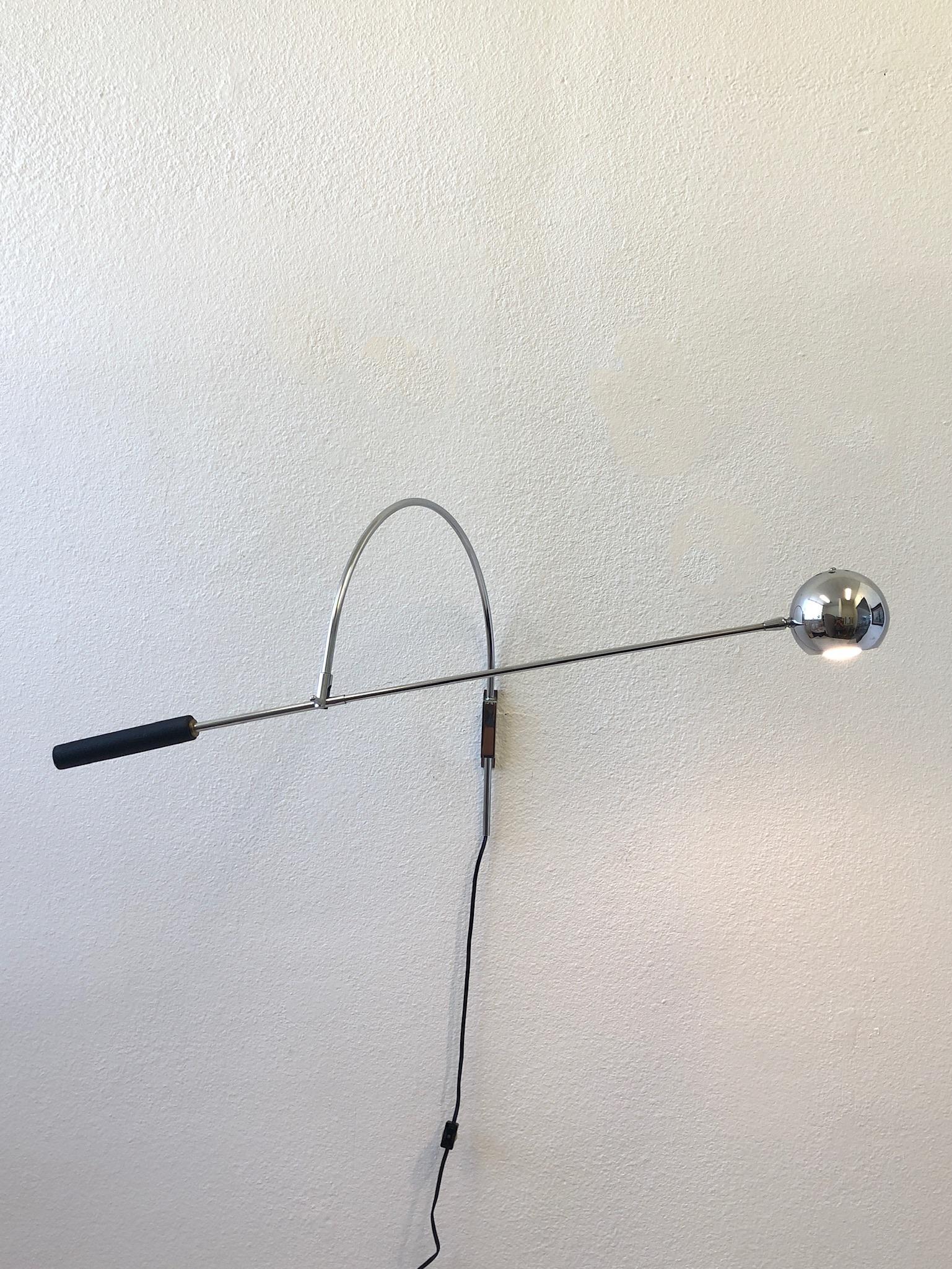 1970’s adjustable polish chrome ‘Orbiter’ wall lamp by Robert Sonneman.
The lamp has an on/off in line switch and takes a small GE 120v 40w max lightbulb.
Measurements:
18” deep from wall.
18” high of arch.
33.5” adjustable arm length.