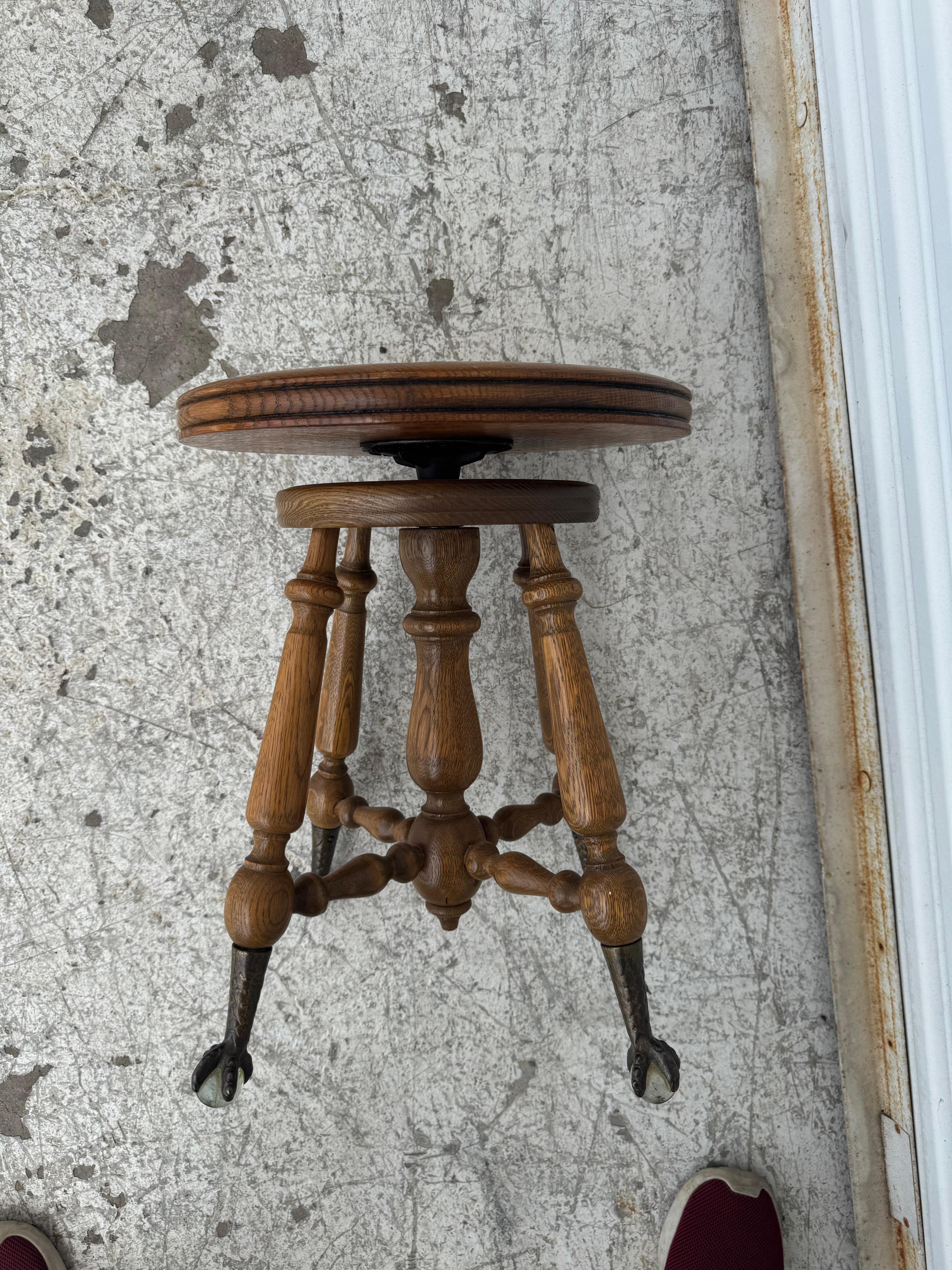 Taburete de Piano Ajustable Claw Ball Hierro en venta