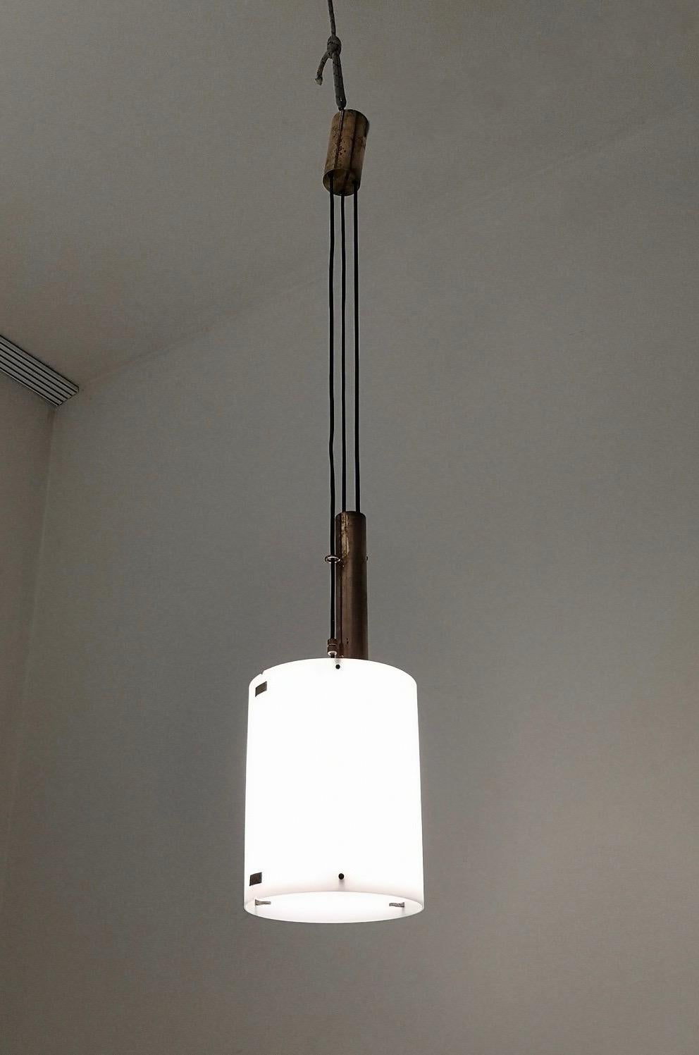 Mid-Century Modern Adjustable Cylinder Pendant Mod. 437 by Tito Agnoli Produced by O-Luce, Italy For Sale