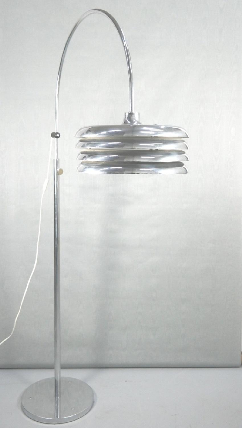 Iconic floor lamp designed by designer Tamas Borsfay. Nickel-plated floor lamp has adjustable height, it's in working order and good condition.