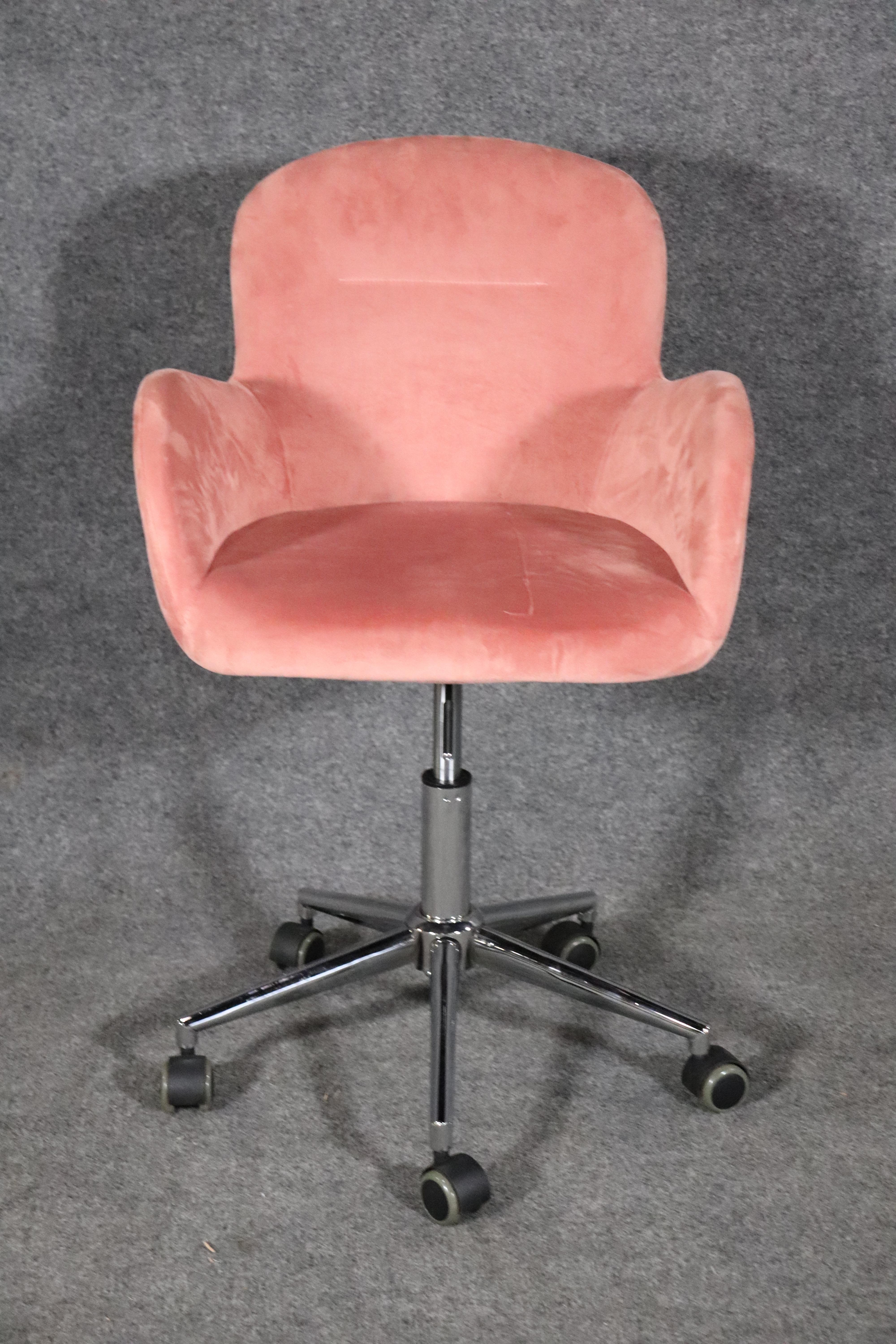 Mid-Century Modern style desk chair in pink fabric on a polished chrome frame.
Please confirm location NY or NJ.