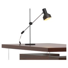 Mid-century adjustable black desk Lamp from the 1950s