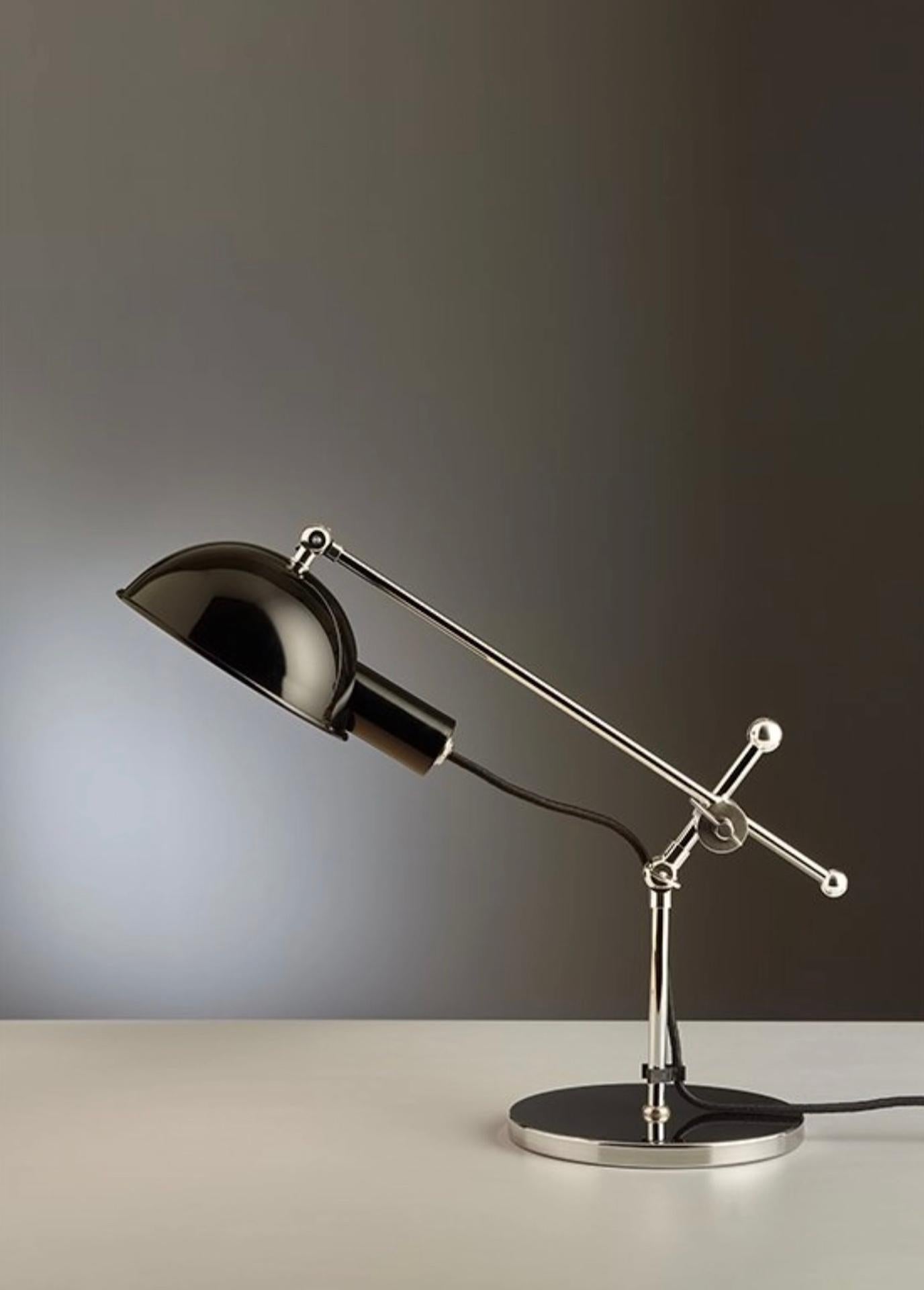 This table lamp has become a coveted designer object and the perfect reflection of Bauhaus design with its basic geometric shapes and asymmetrical elements. It was created in 1927, but its designer is sadly unknown. Its striking hemisphere is made