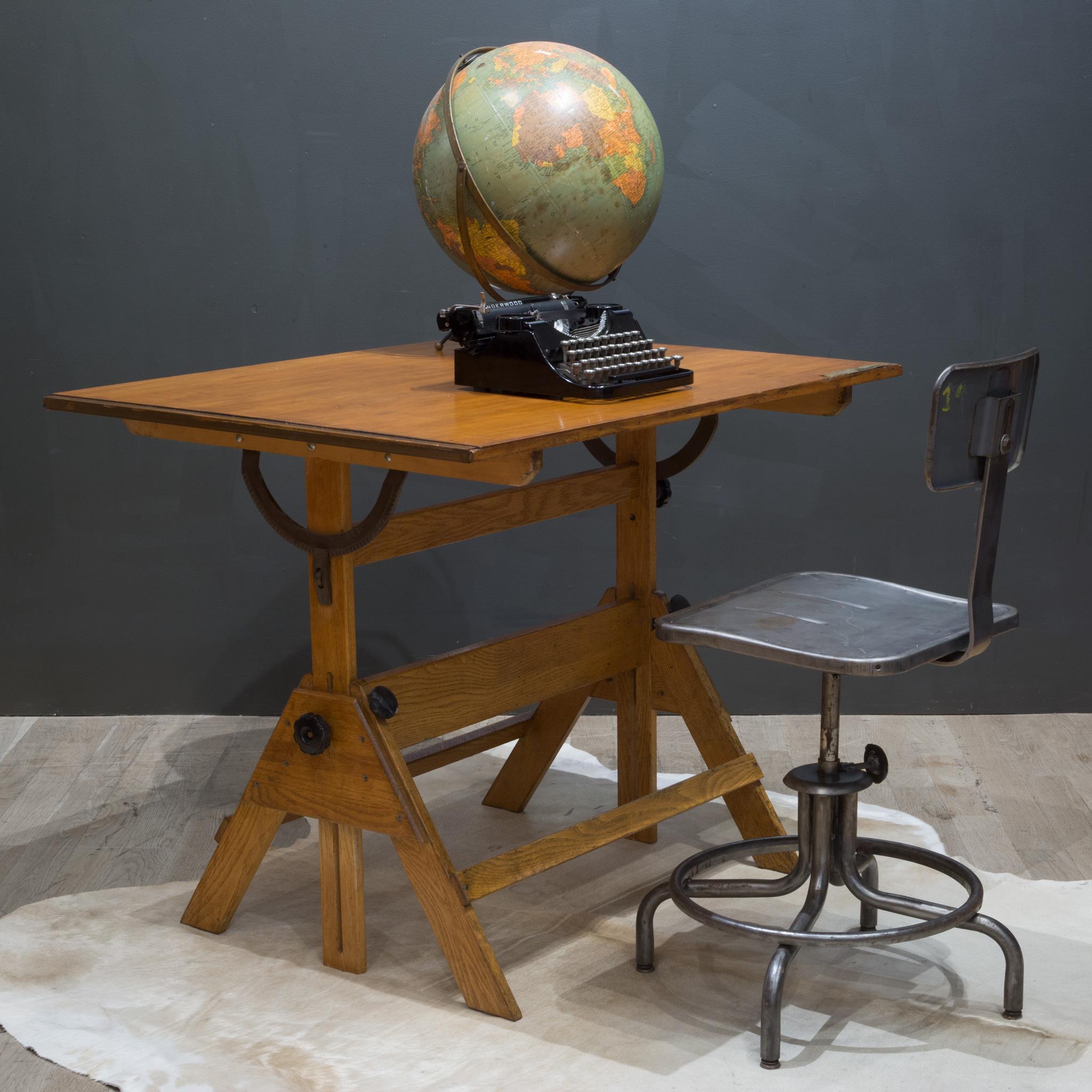 About

An industrial wood drafting table with large, wooden top, steel hinges and large handles on the side. The table can be used as a dining table, desk or drafting table. If used as a drafting table, the angle of the top and the height of the