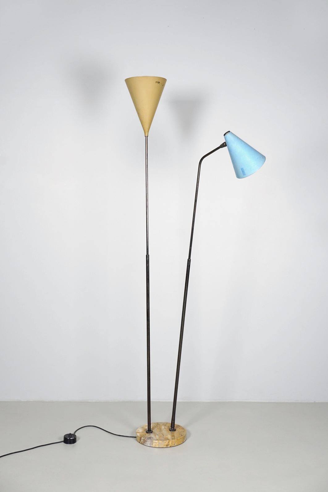 Two colored floor lamp with adjustable poles and reflectors, made of brass, lacquered aluminum and a marble foot. Original lacquering and light switch. Adjustable in height through a telescope like pole and in lighting direction through rotatable
