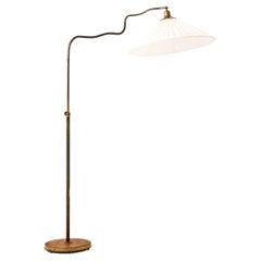 Lampadaire réglable en laiton, années 1940