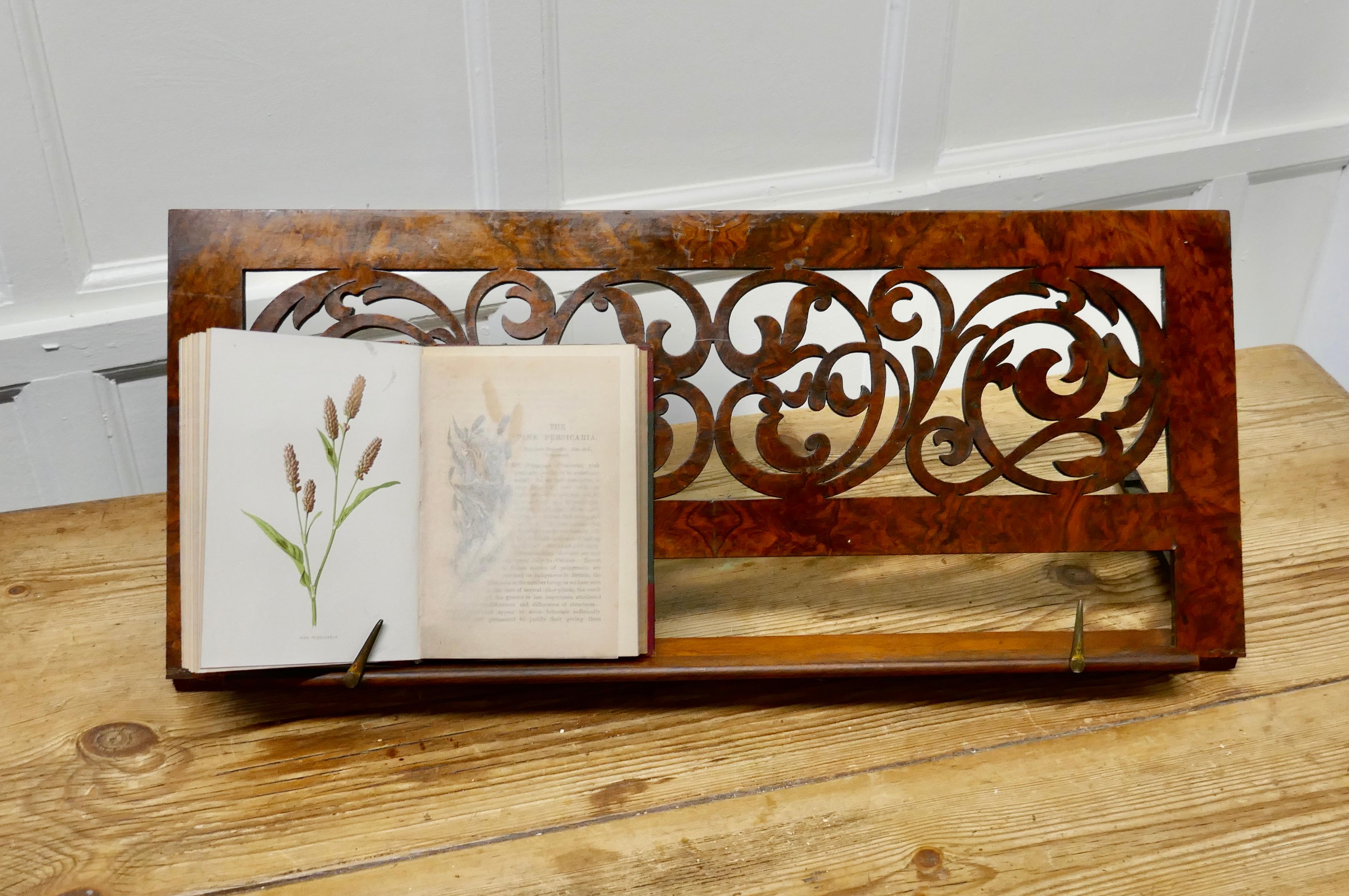 Adjustable fretwork figured walnut book rest or, lutrin

This is a charming piece, it is larger than normal and made in beautifully figured walnut, it dates from the end of the 19th century and has been superbly handcrafted by a skilful