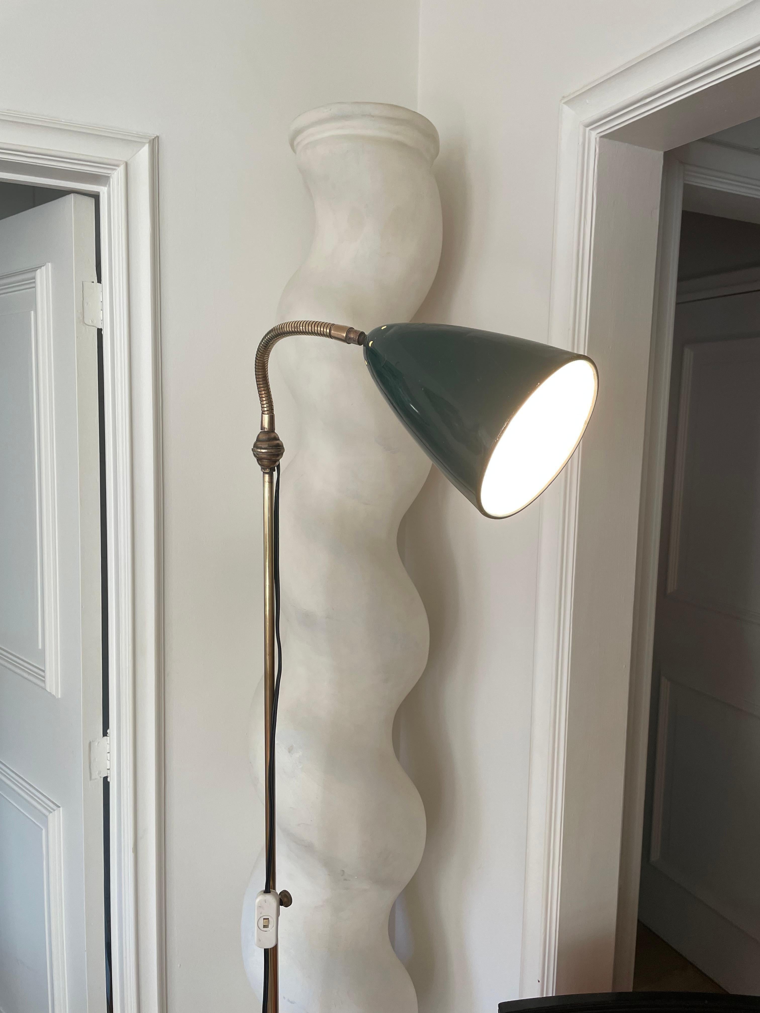 Adjustable Industrial Floor Lamp With A Green Reflector, France 1950. For Sale 2